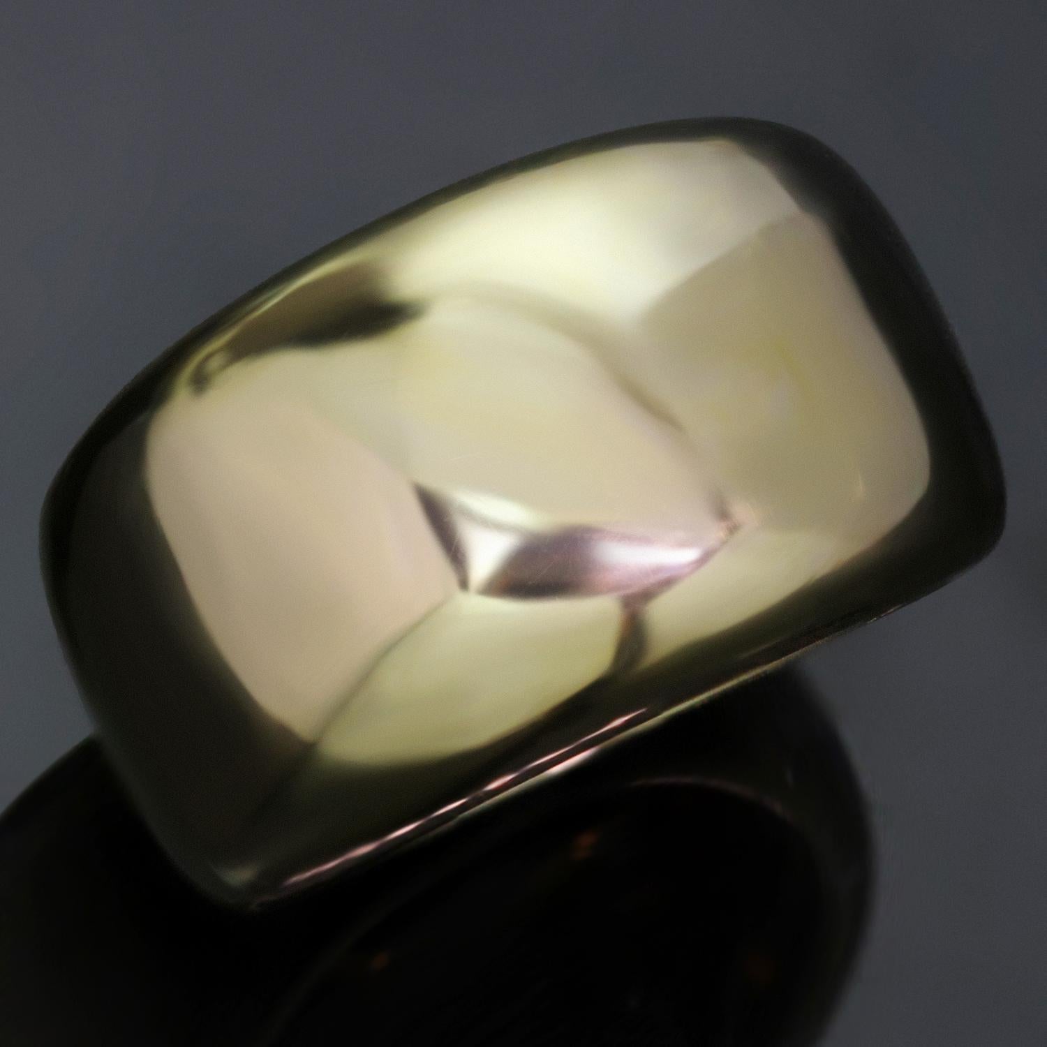 This classic Cartier ring from the Nouvelle Vague features a wide band design crafted in 18k yellow gold. Made in France circa 1990s.  Measurements: 0.51