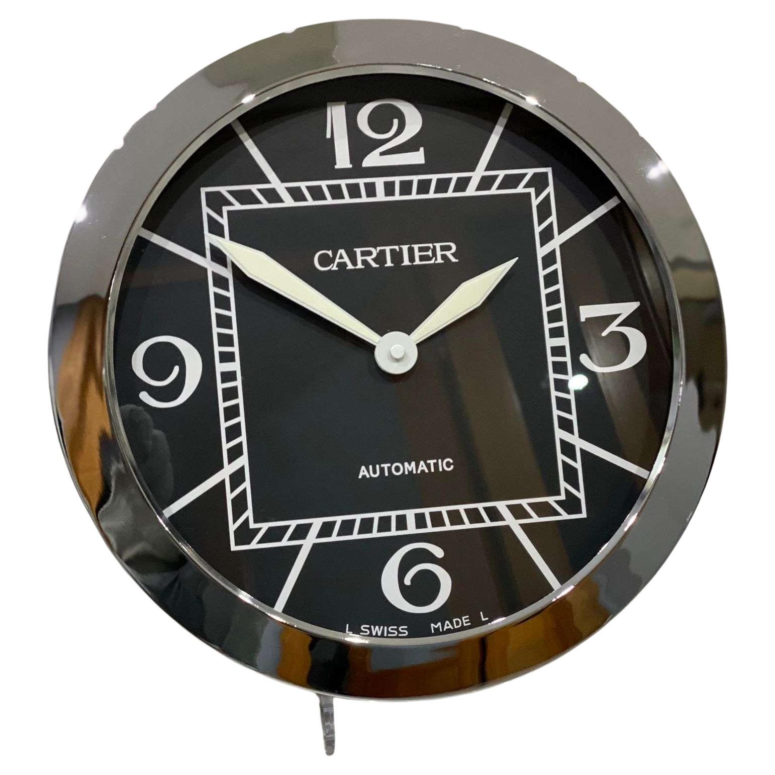 Horloge murale Cartier officiellement certifiée argent, chromée et noire 