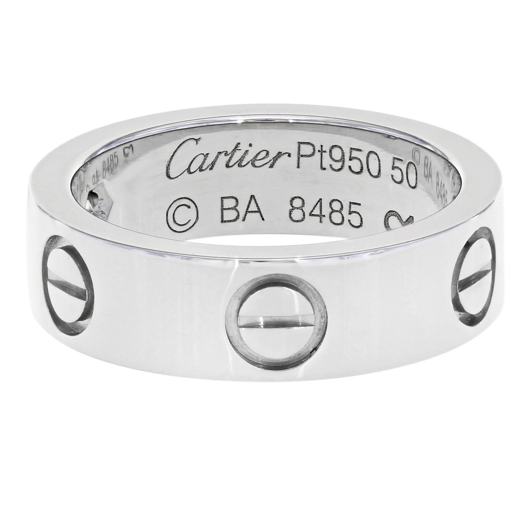 Cartier love collection ring set with one round diamond in Platinum. Ring width 5.4mm.

Platinum weighs 11.9g
1 round diamonds, total weight 0.07ct
Diamond F color VS1 clarity 
Band measures 5.4mm wide        
Ring US Size 5.25                      