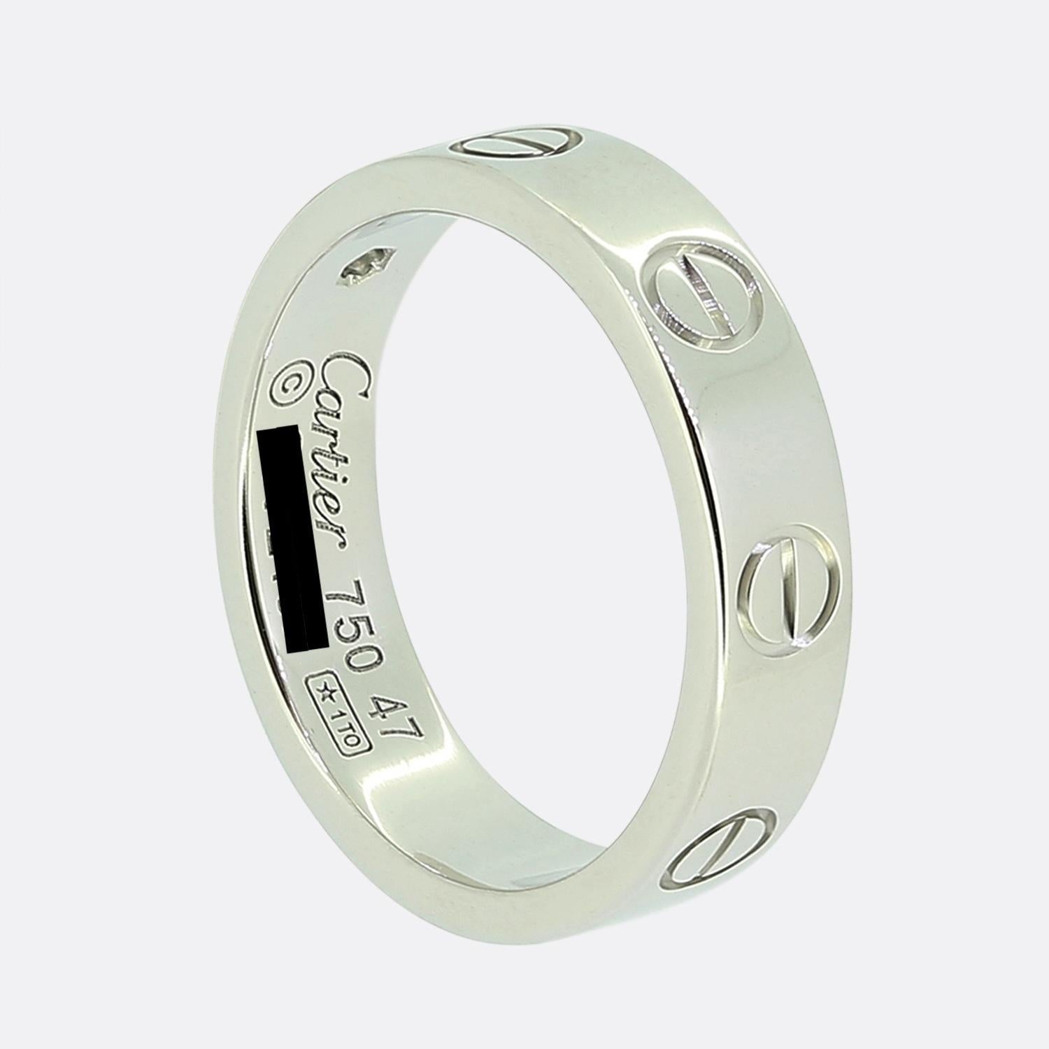 Here we have an 18ct white gold ring from the world the renowned luxury jewellery house of Cartier. This ring forms part of their LOVE collection and showcases a single round brilliant cut diamonds alongside the iconic screw motif. This ring is the