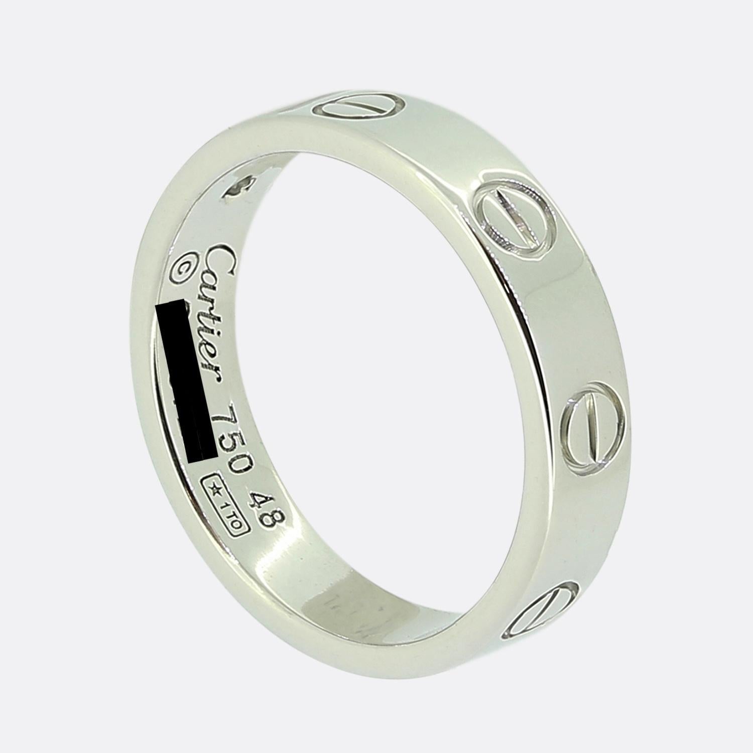 Here we have an 18ct white gold ring from the world the renowned luxury jewellery house of Cartier. This ring forms part of their LOVE collection and showcases a single round brilliant cut diamonds alongside the iconic screw motif. This ring is the
