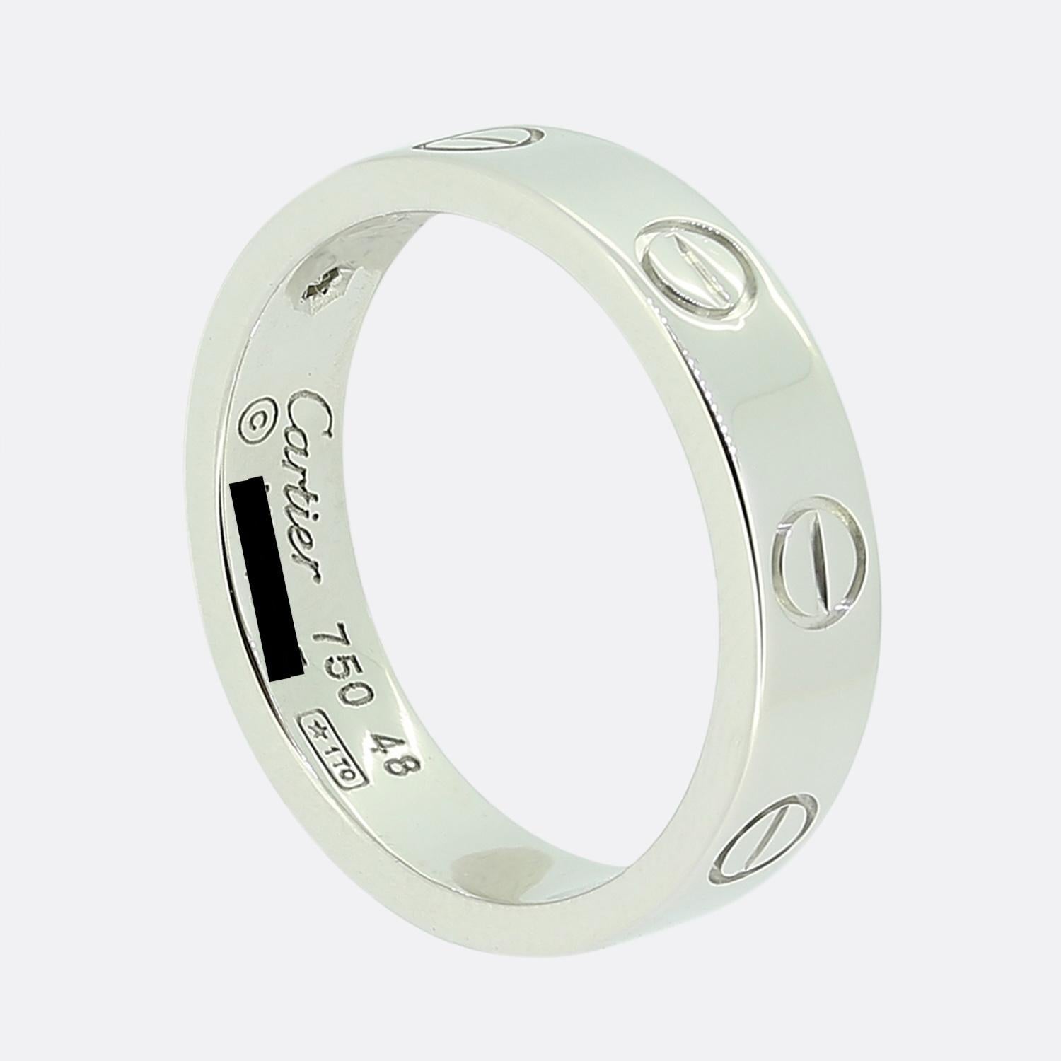Here we have an 18ct white gold ring from the world the renowned luxury jewellery house of Cartier. This ring forms part of their LOVE collection and showcases a single round brilliant cut diamonds alongside the iconic screw motif. This ring is the