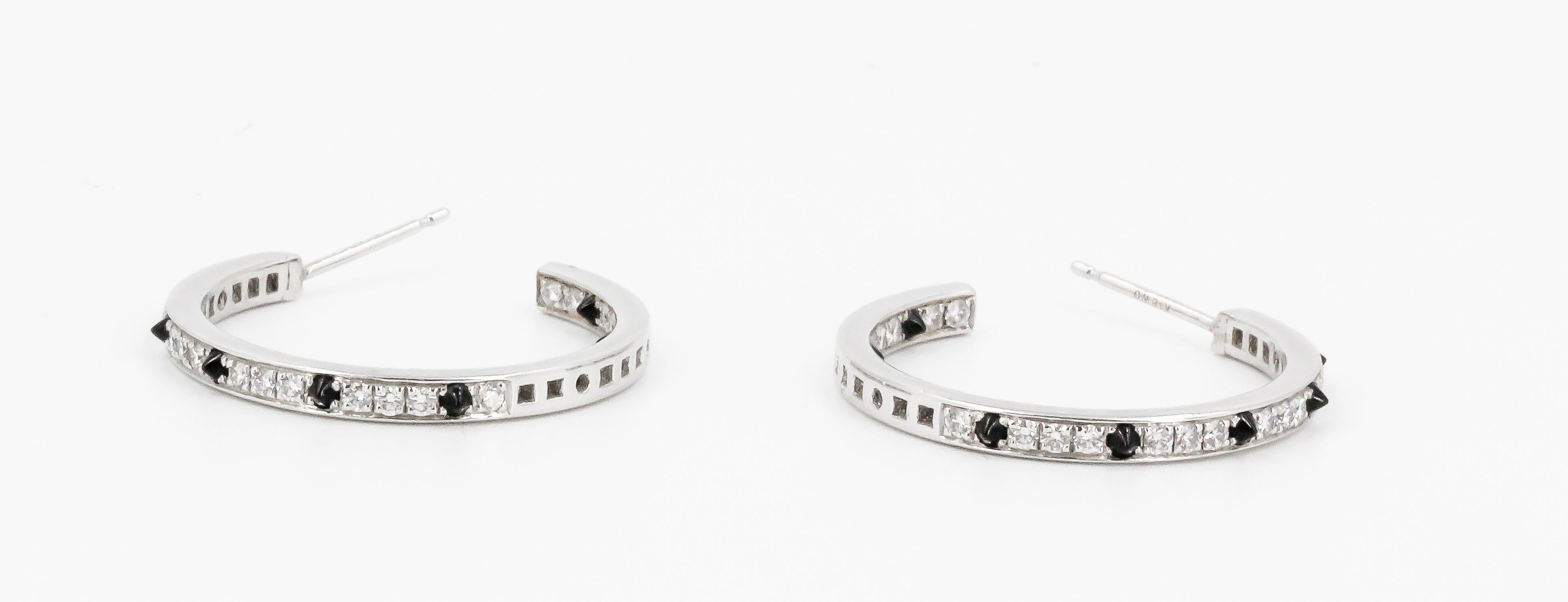 Cartier Onyx, Diamond and 18 Karat White Gold Inside Out Hoop Earrings In Excellent Condition In New York, NY