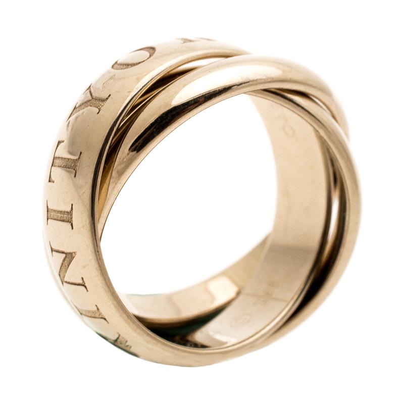 This beautiful ring belongs to the Cartier's Trinity collection, a line that embodies love, fidelity, and friendship through the tri-band. This vintage piece dates back to 1998 and is crafted from 18k yellow gold. The ring flaunts three interlocking