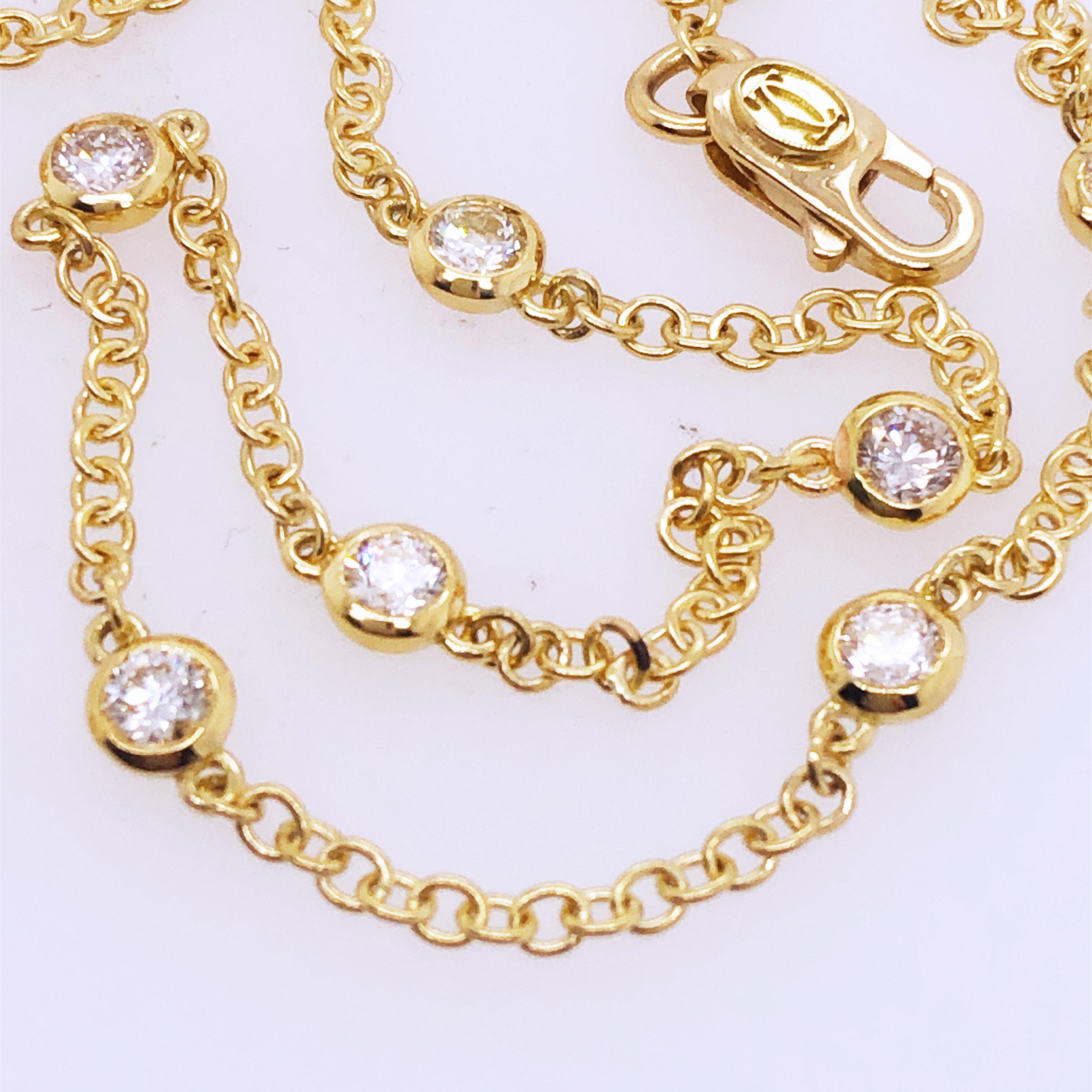 Collier original de 1985:: extrêmement rare:: en or jaune 18 carats:: diamants au mètre:: 44 cm : Cartier développe l'idée de déployer des diamants exceptionnels dans un design minimaliste. 
Une chaîne jaune:: simple et facile à porter:: est reliée