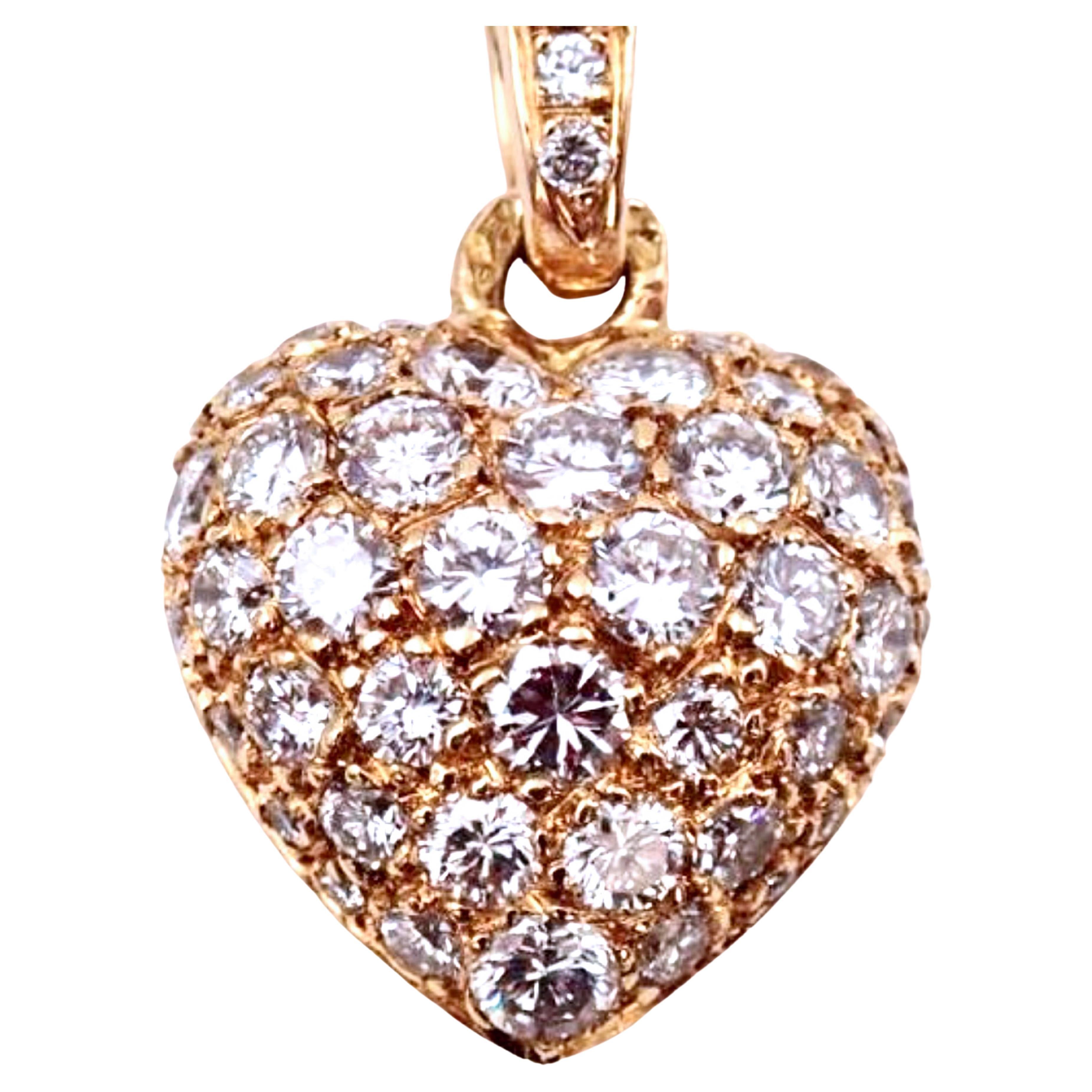 Original 1990, Cartier White Diamond 18Kt Yellow Gold Heart Pendant and Necklace  18.11inches(46cm).
A very precious, iconic Cartier top quality circa 1.44KT white diamond heart in a simple, all time wearable 18kt yellow gold chain (with double