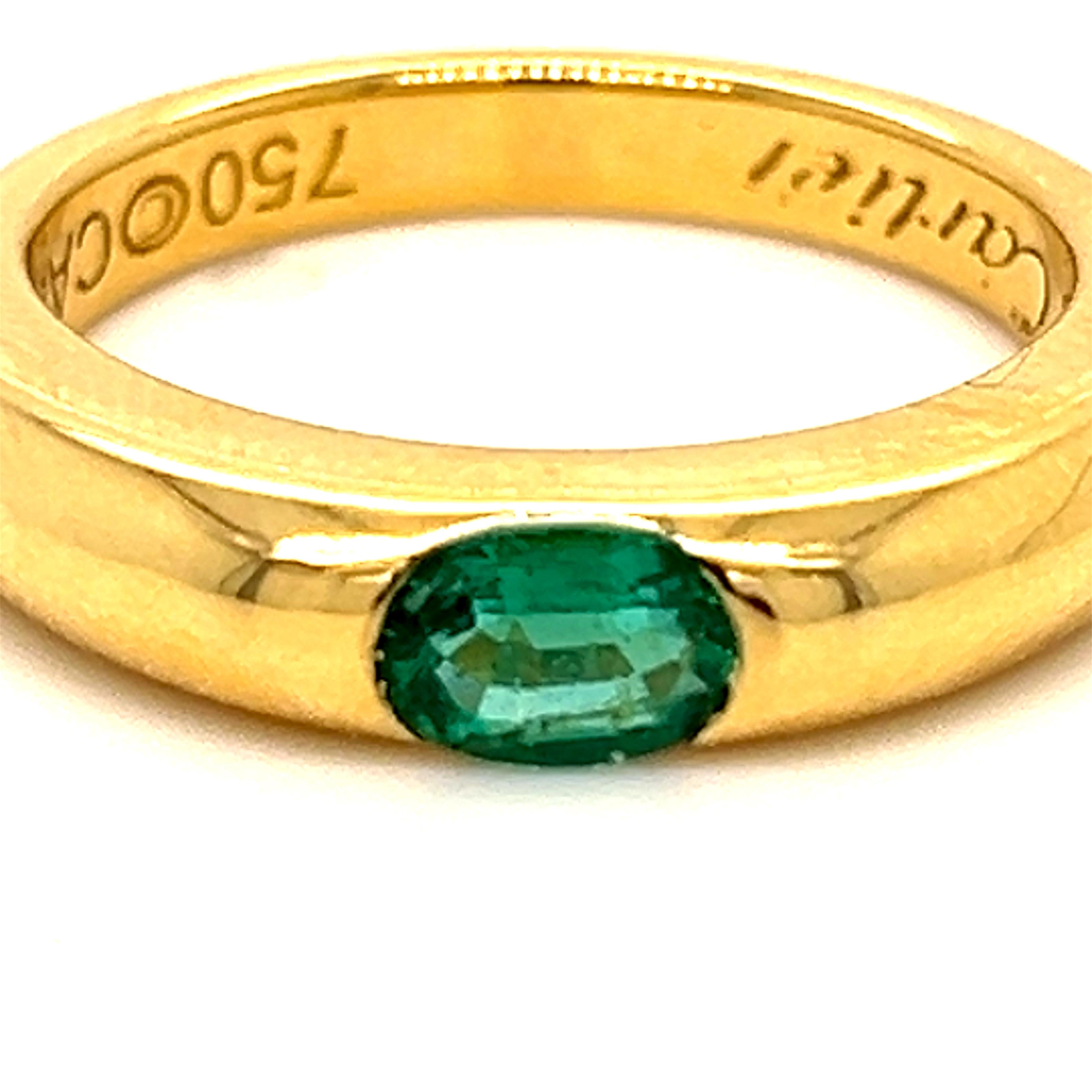 Original 1992, Cartier Oval  Natural Emerald 18Kt Yellow Gold iconic Ellipse ring, French size 54, Us Size 6 3/4.
A very precious Cartier circa 0.50KT Top Quality Oval Natural Emerald in a simple, all time wearable 18kt yellow gold setting timeless