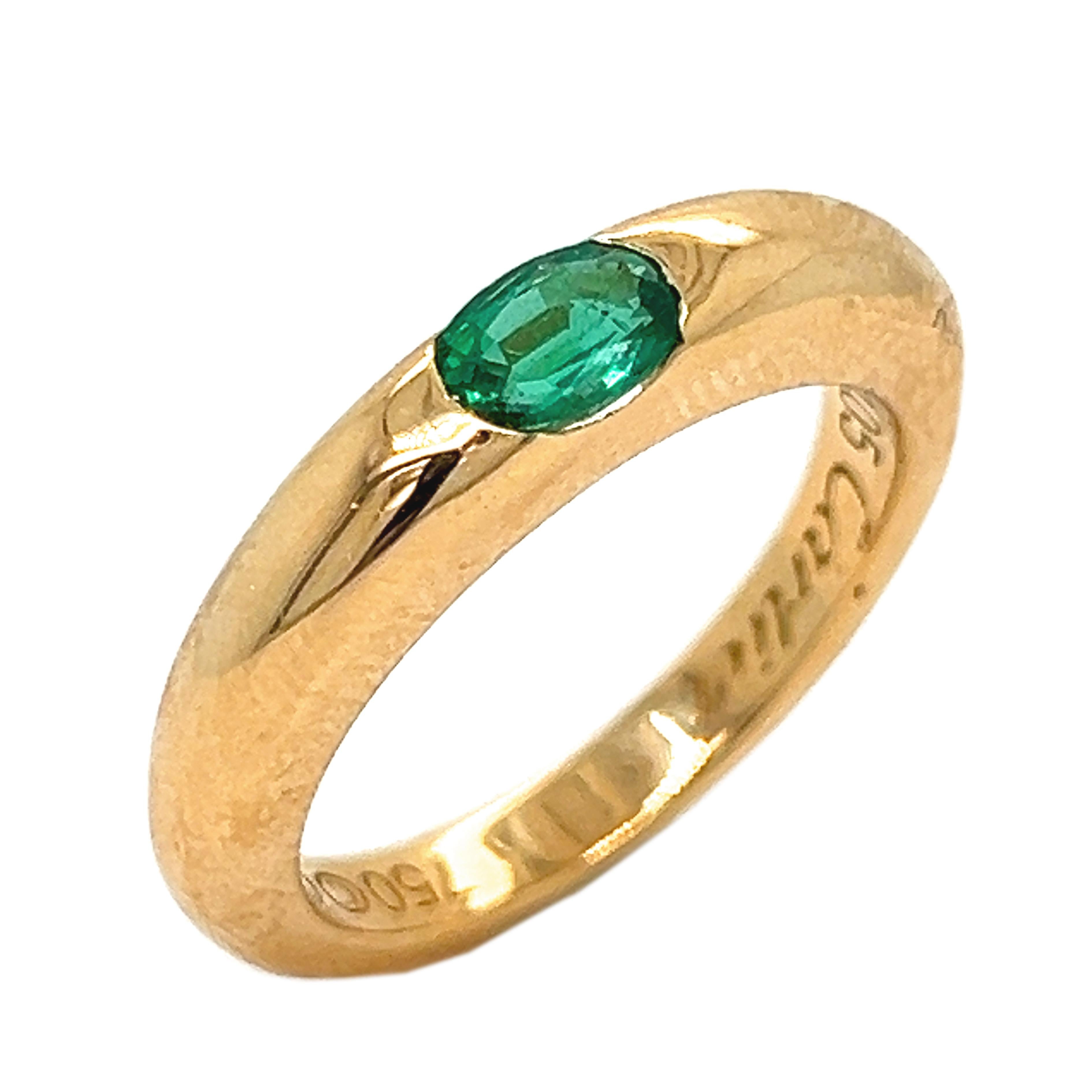 Modern Cartier Original 1992 Oval Emerald 18 Karat Yellow Gold Ellipse Ring For Sale