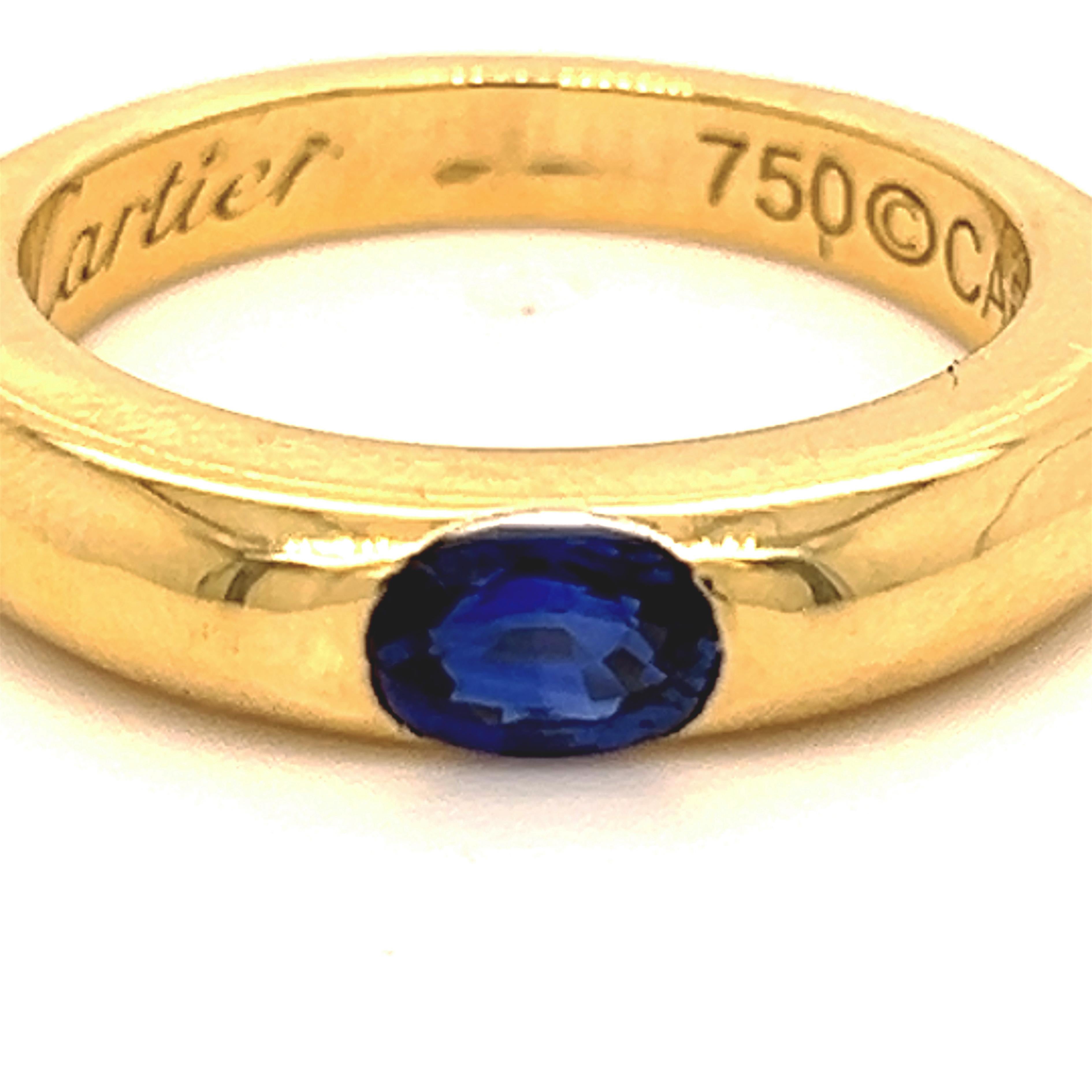 Original 1992, Cartier Oval Royal Blue Sapphire 18Kt Yellow Gold iconic Ellipse ring, French size 53, US Size 6 1/2.
A very precious Cartier circa 0.71KT Top Quality Oval Sapphire in a simple, all time wearable 18kt yellow gold setting timeless ring