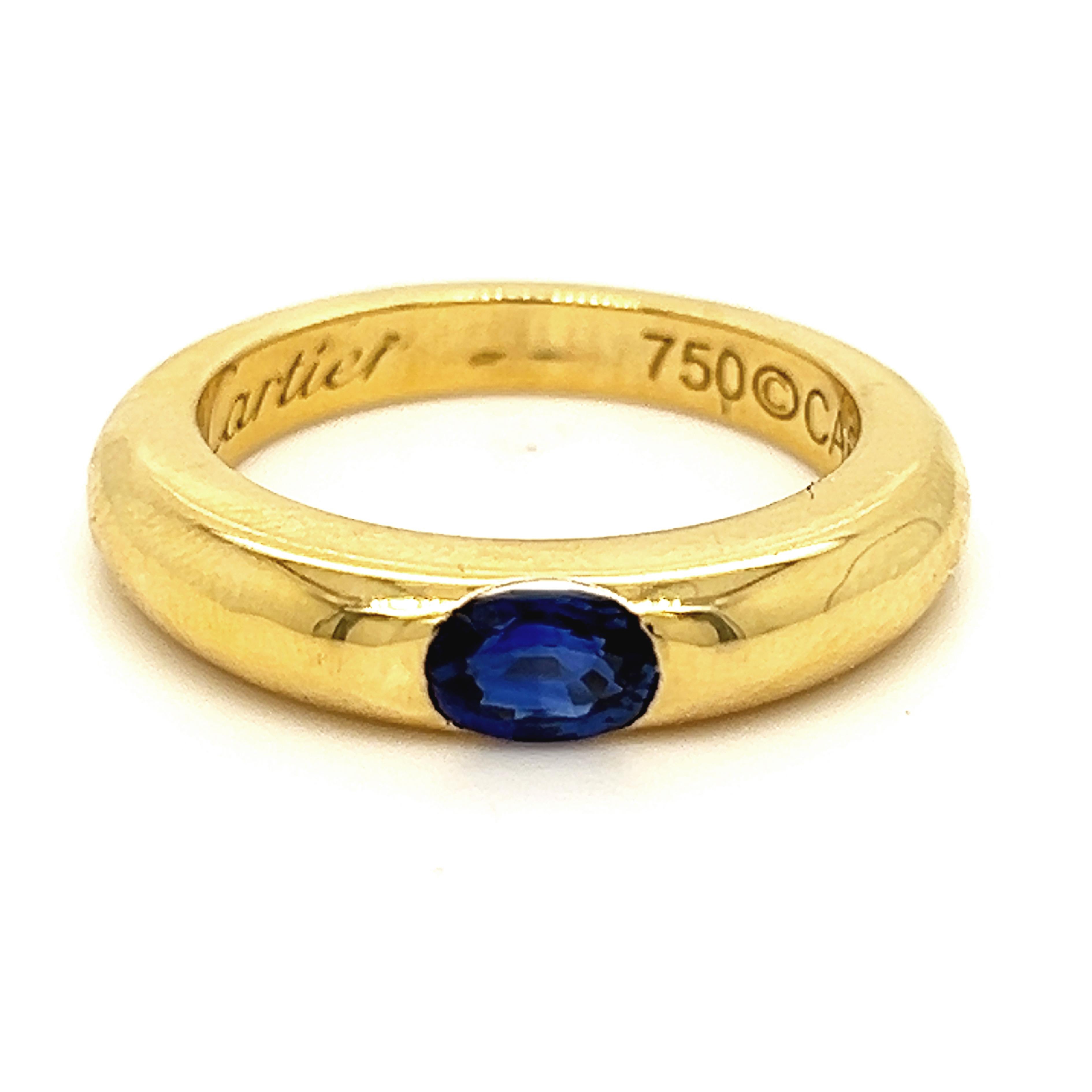 Modern Cartier Original 1992 Oval Royal Blue Sapphire 18 Karat Yellow Gold Ellipse Ring For Sale