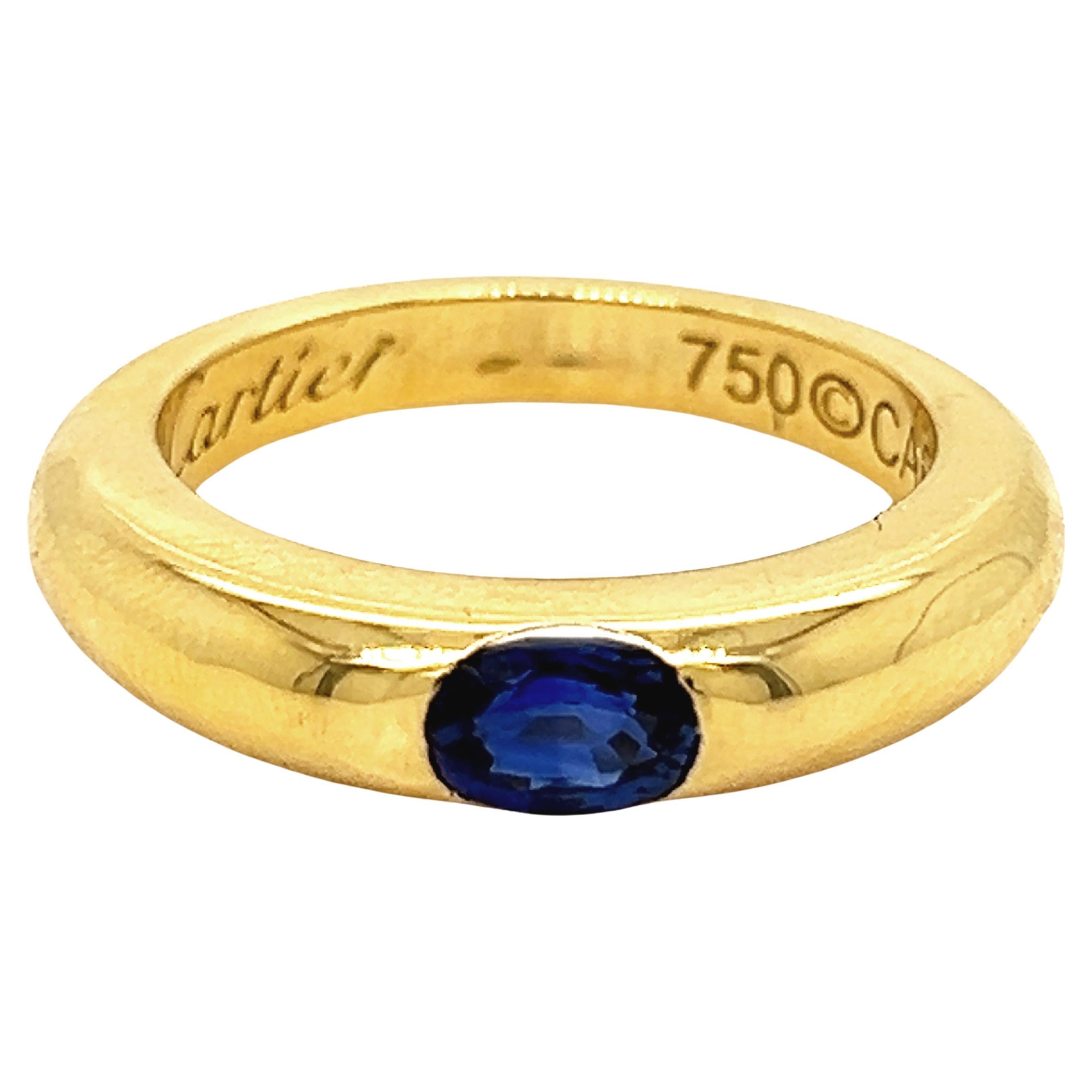 Cartier Original 1992 Oval Royal Blue Sapphire 18 Karat Yellow Gold Ellipse Ring For Sale