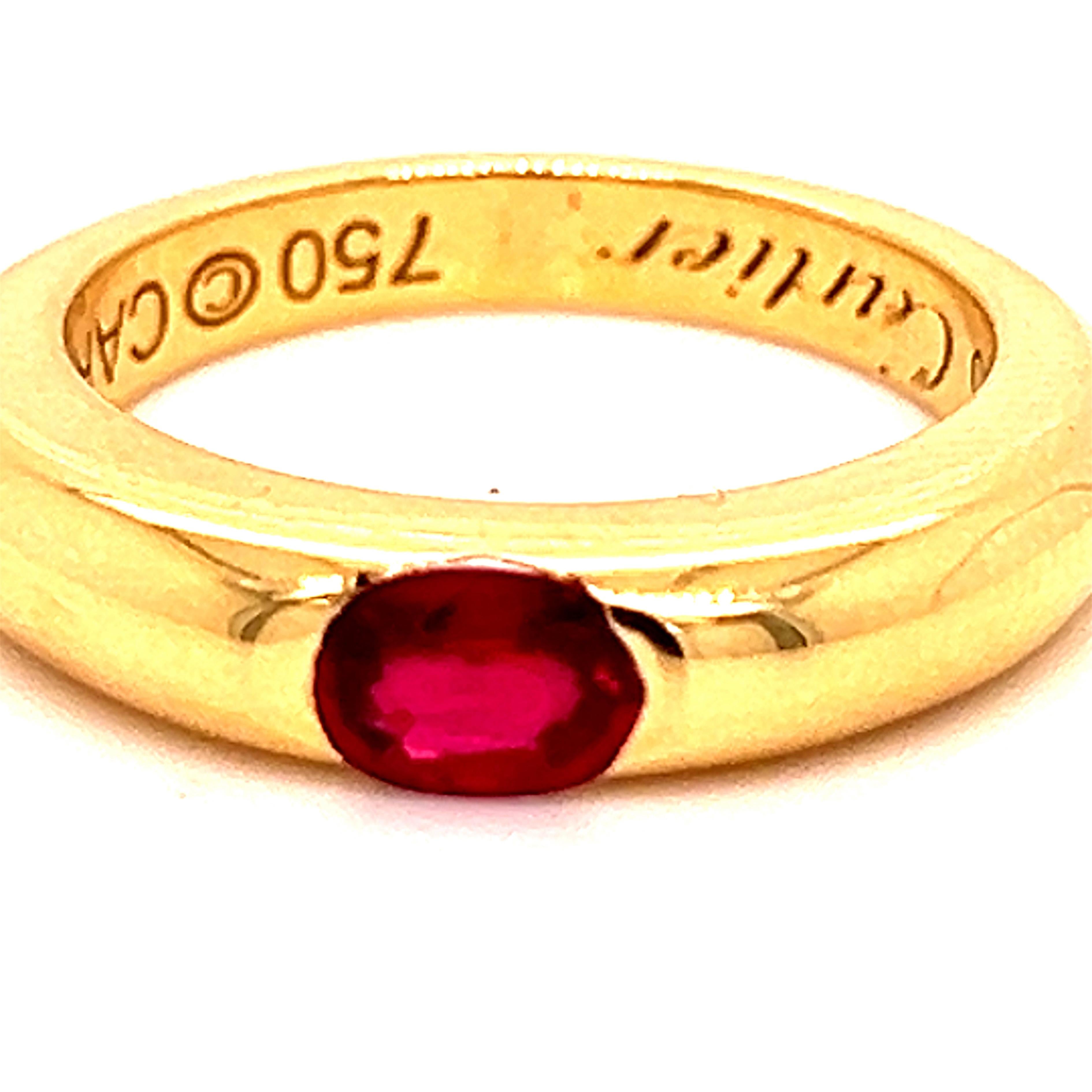 Original 1992, Cartier Oval Red Ruby 18Kt Yellow Gold iconic Ellipse ring, French size 52, Us Size 6.
A very precious Cartier circa 0.60KT Top Quality Oval Red Ruby in a simple, all time wearable 18kt yellow gold setting timeless ring . 
Brimming