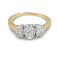Cartier oval cut diamond 18k yellow gold and platinum engagement ring