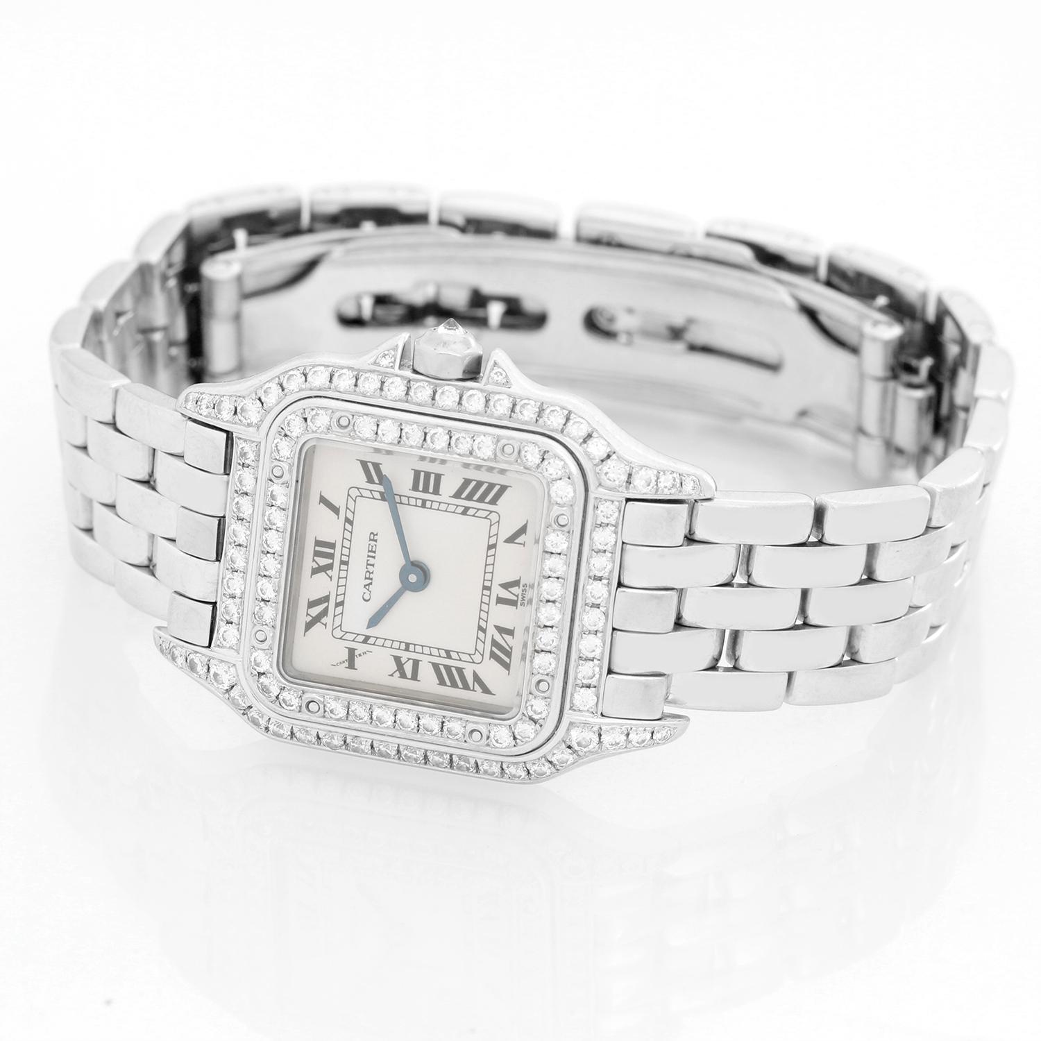 Cartier Panther 18K White Gold with Double Diamond Bezel -  Quartz. 18K White Gold case (  22 mm ). Ivory dial with blue steel hands; Roman numerals. 18K White Gold bracelet. Pre-owned with Cartier box and books.