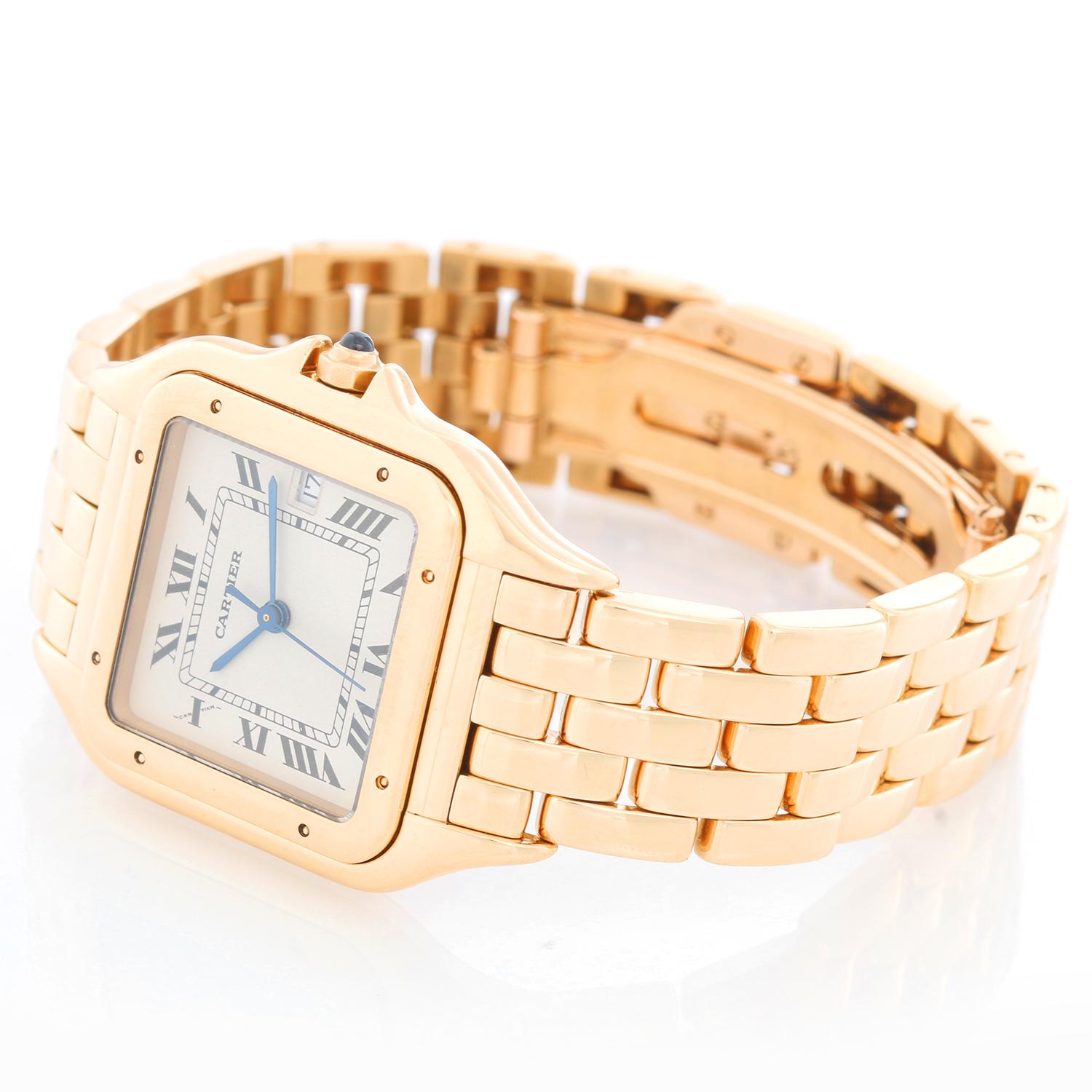 Cartier Panther 18k Yellow Gold Men's Quartz Watch with Date - Quartz. 18k yellow gold case (27mm x 37mm). Ivory colored dial with black Roman numerals and date at 5 o'clock. 18k yellow gold Cartier Panther bracelet with deployant clasp. Pre-owned