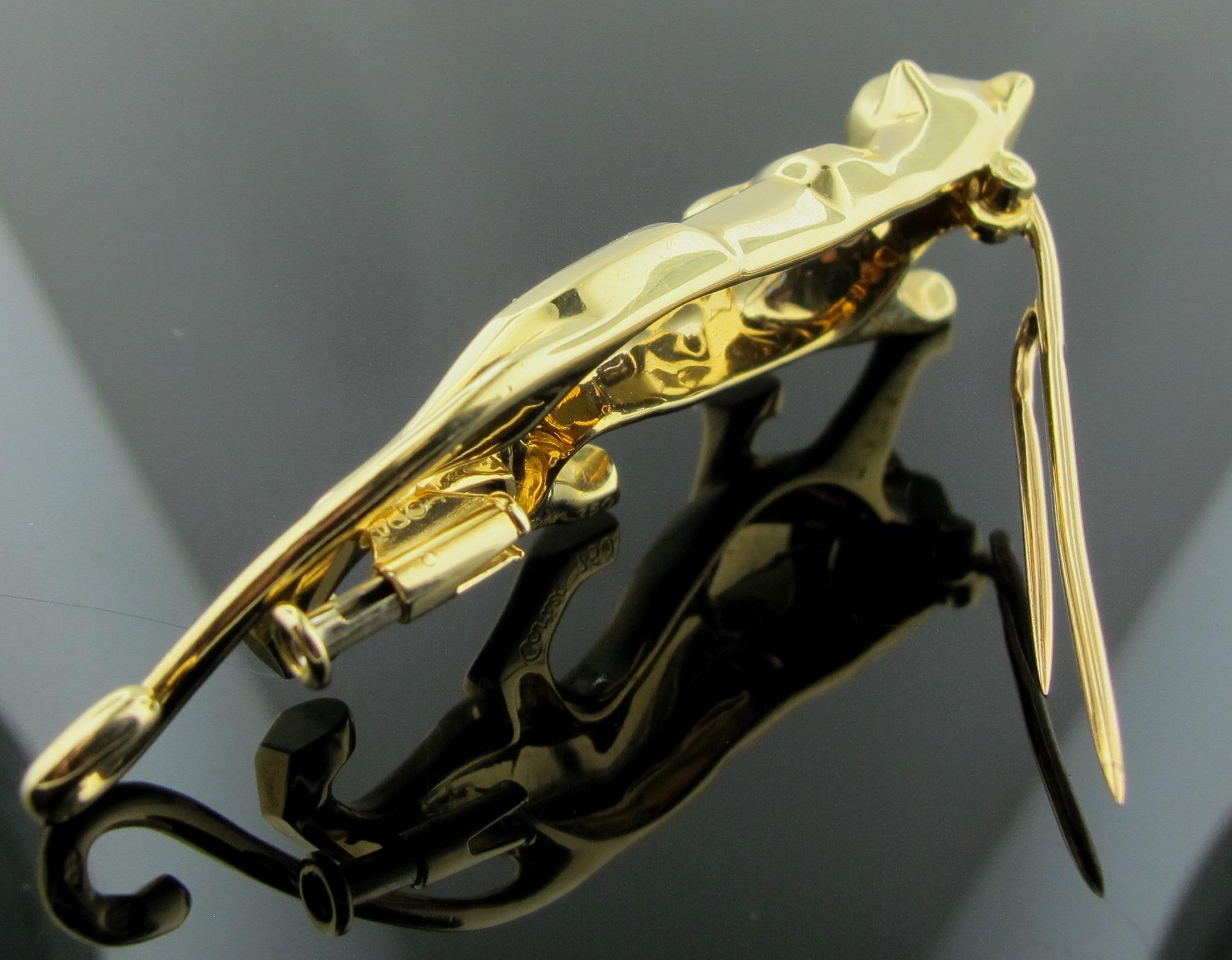 Cartier Panther de Cartier 18 Karat Yellow Gold Panther Brooch with Emerald Eyes In Excellent Condition In Palm Desert, CA