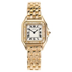 Reloj de pulsera Cartier Panther Bisel de diamantes Esfera plateada Oro amarillo 18k