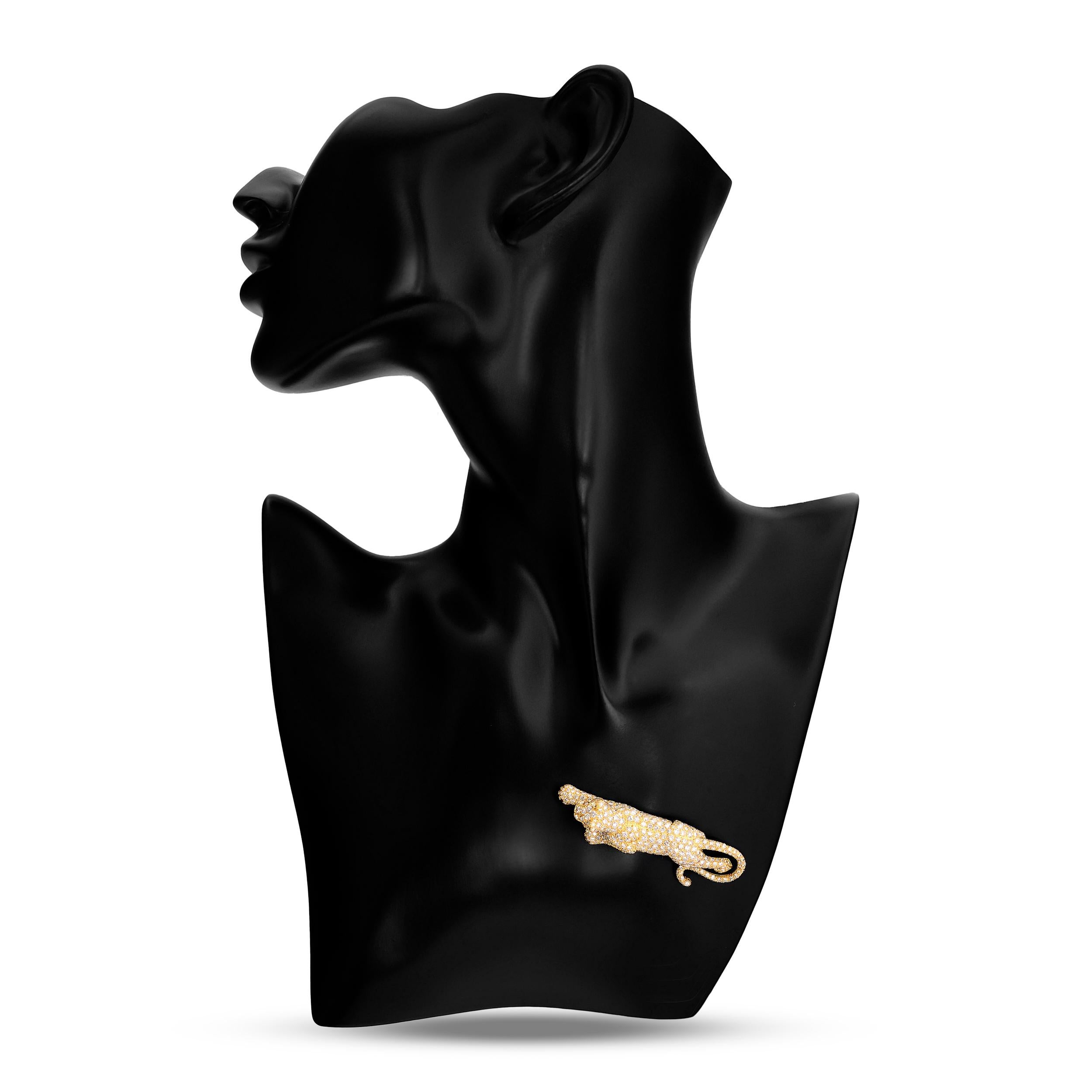 The Cartier diamond panther brooch captivates with its elegant craftsmanship, featuring meticulously set diamonds that bring to life the fierce and graceful essence of the iconic panther.

This pin features approximately 10.00 carats of round