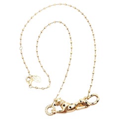 Collar de Cartier con la pantera de diamantes y tsavorita, con cadena de oro amarillo