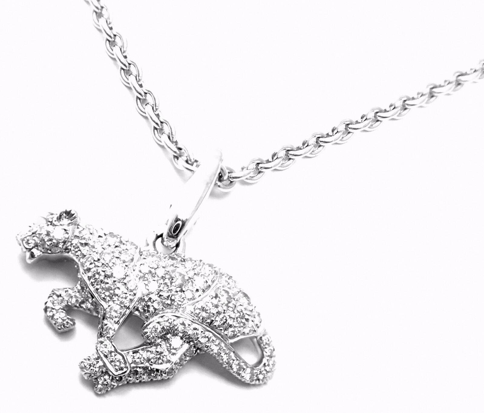 18k White Gold Panther Diamond Pendant Necklace by Cartier. 
Part of the Panthere Collection. 
With Round brilliant cut diamonds
 VVS1 clarity, E color total weight approx. .50ct
Details: 
Weight: 12.1 grams
Length: 17