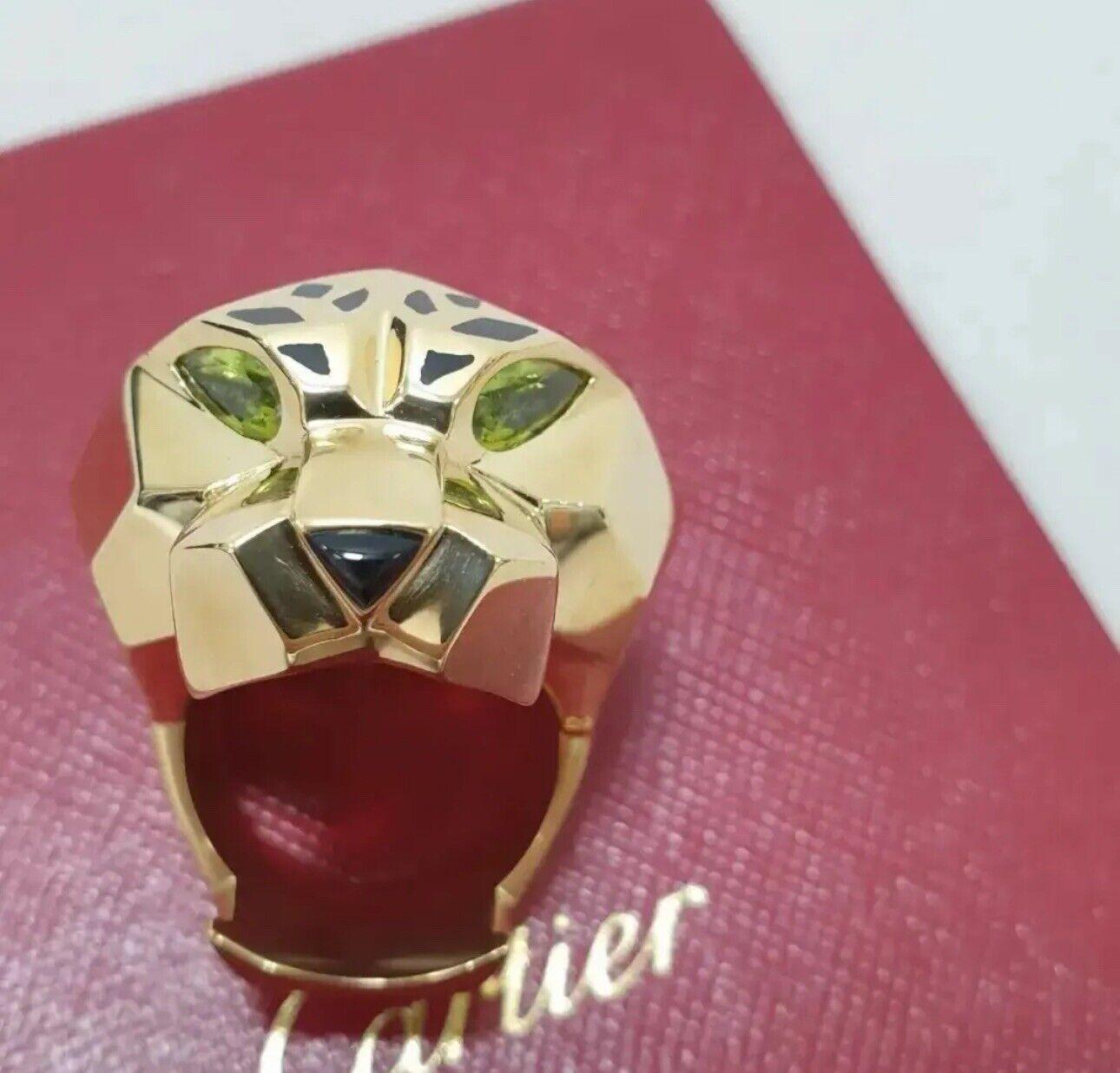 CARTIER Panther Head  Yellow Gold Ring

Comes with Cartier box & Certificate

Size 56

Very good condition