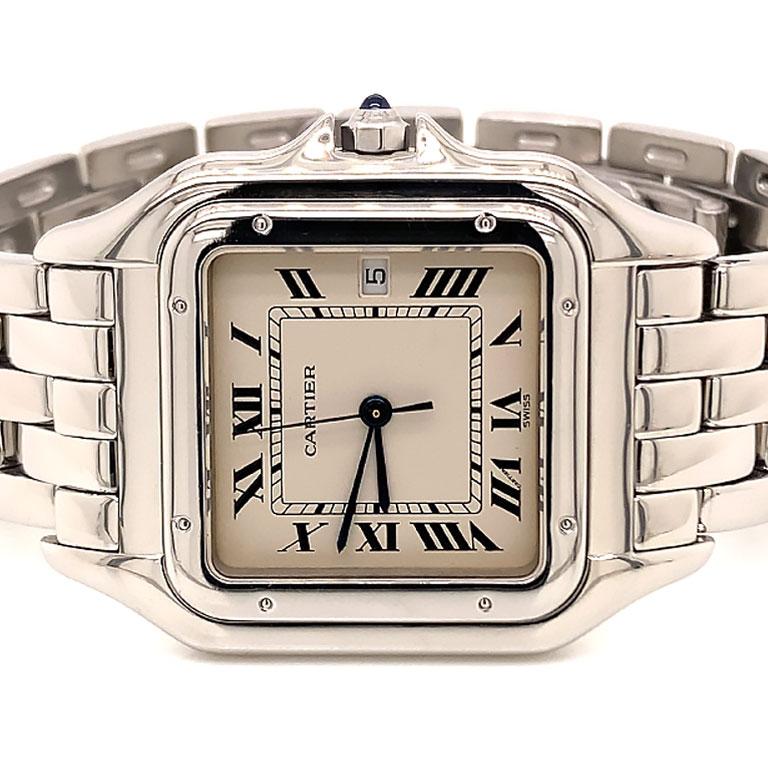 Authentic vintage Cartier Panther jumbo stainless steel watch Ref. 130 000 C. The stainless steel case is 29.50mm with closed solid back. The watch has an off white silver powdered dial with black Roman numerals and blue steel sword hour and minute