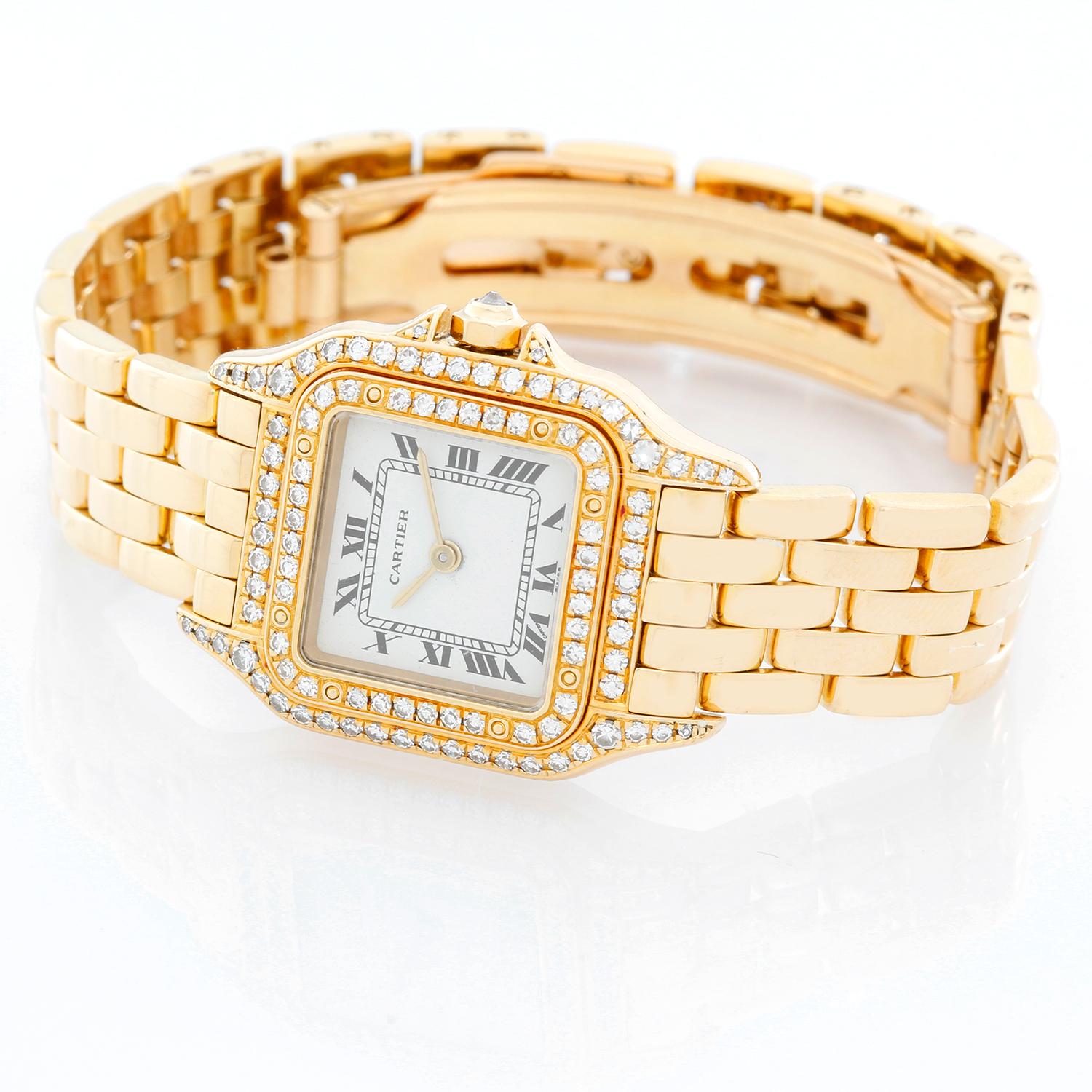 Cartier Panther Ladies 18k Yellow Gold Diamond Watch - Quartz. 18k yellow gold case with factory diamond bezel (22mm x 30mm). Ivory colored dial with black Roman numerals . 18k yellow gold Panther bracelet. Pre-owned with box and book. 