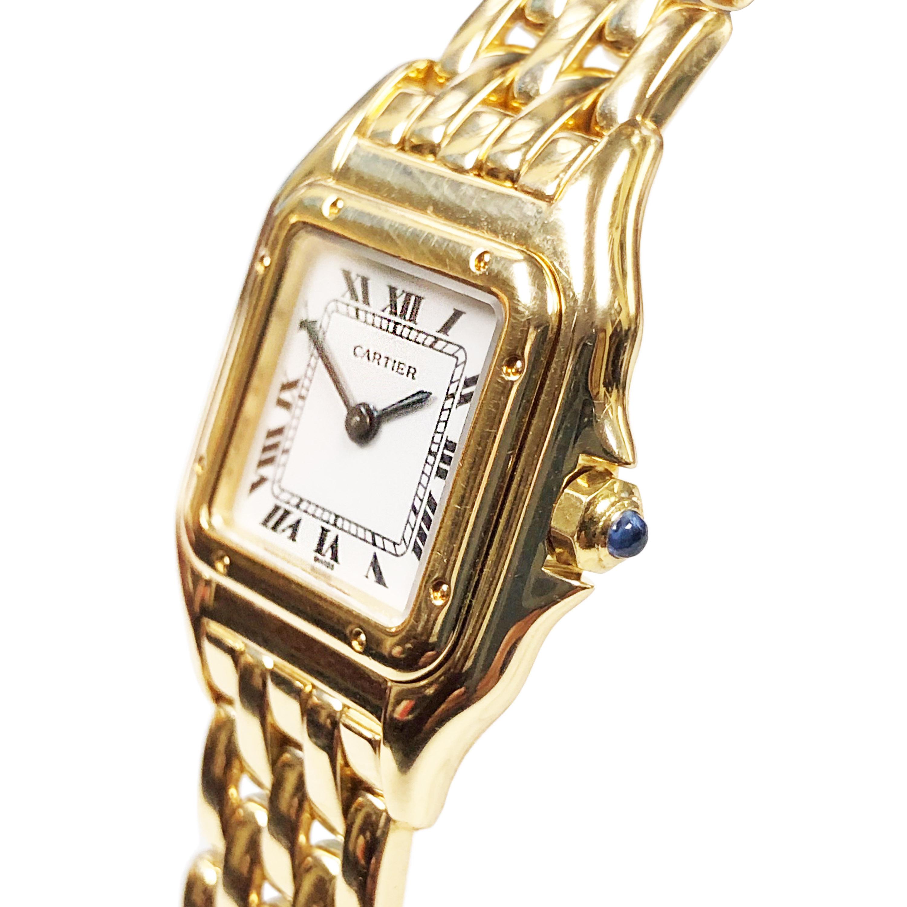 Circa 2000 Cartier 18K Yellow Gold Ladies Panther Wrist Watch. 29 X 22 MM water resistant case. Quartz Movement, White Dial with Black Roman numerals and a Sapphire Crown, 1/2 inch wide Panther Bracelet with Fold over Deployment Buckle. Measuring 6