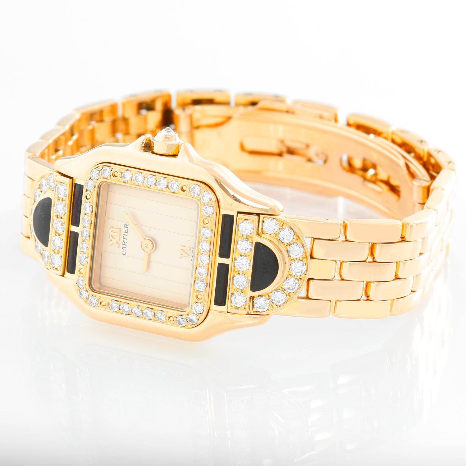 Cartier Panther Ladies 18k Yellow Gold Diamond Watch - Quartz. 18k yellow gold case with factory diamond bezel and lugs with black enamel (21mm x 30mm). Creme colored dial with raised gold Roman numeral at noon and 6 o'clock. 18k yellow gold Panther