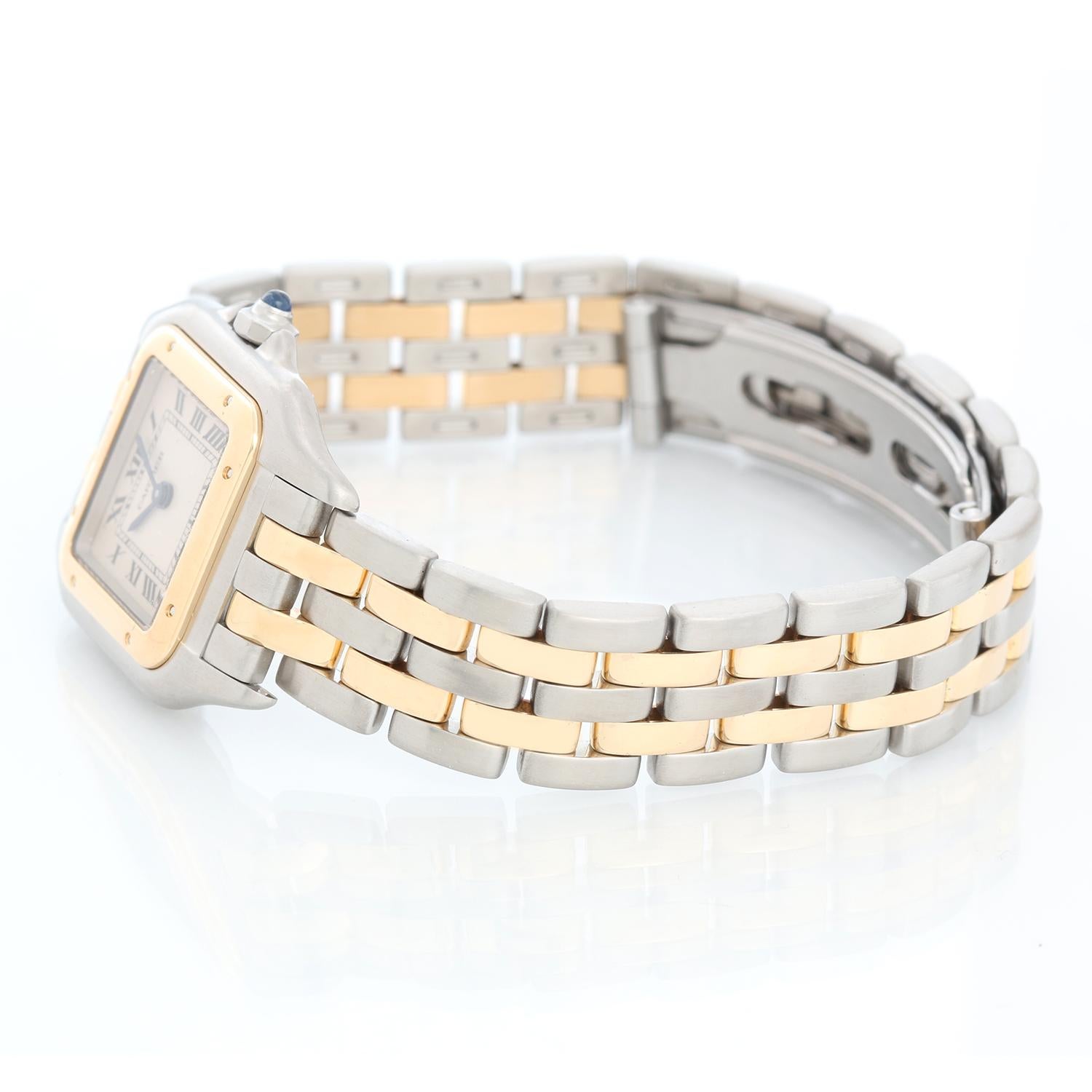 Cartier Panther Ladies 2-Tone 2-Row Steel & Gold Watch W25029B6 - Quartz. Stainless steel case with 18k yellow gold bezel (21mm x 30mm). Ivory colored dial with black Roman numerals. Stainless steel and 2-row 18k yellow gold Panthere bracelet.