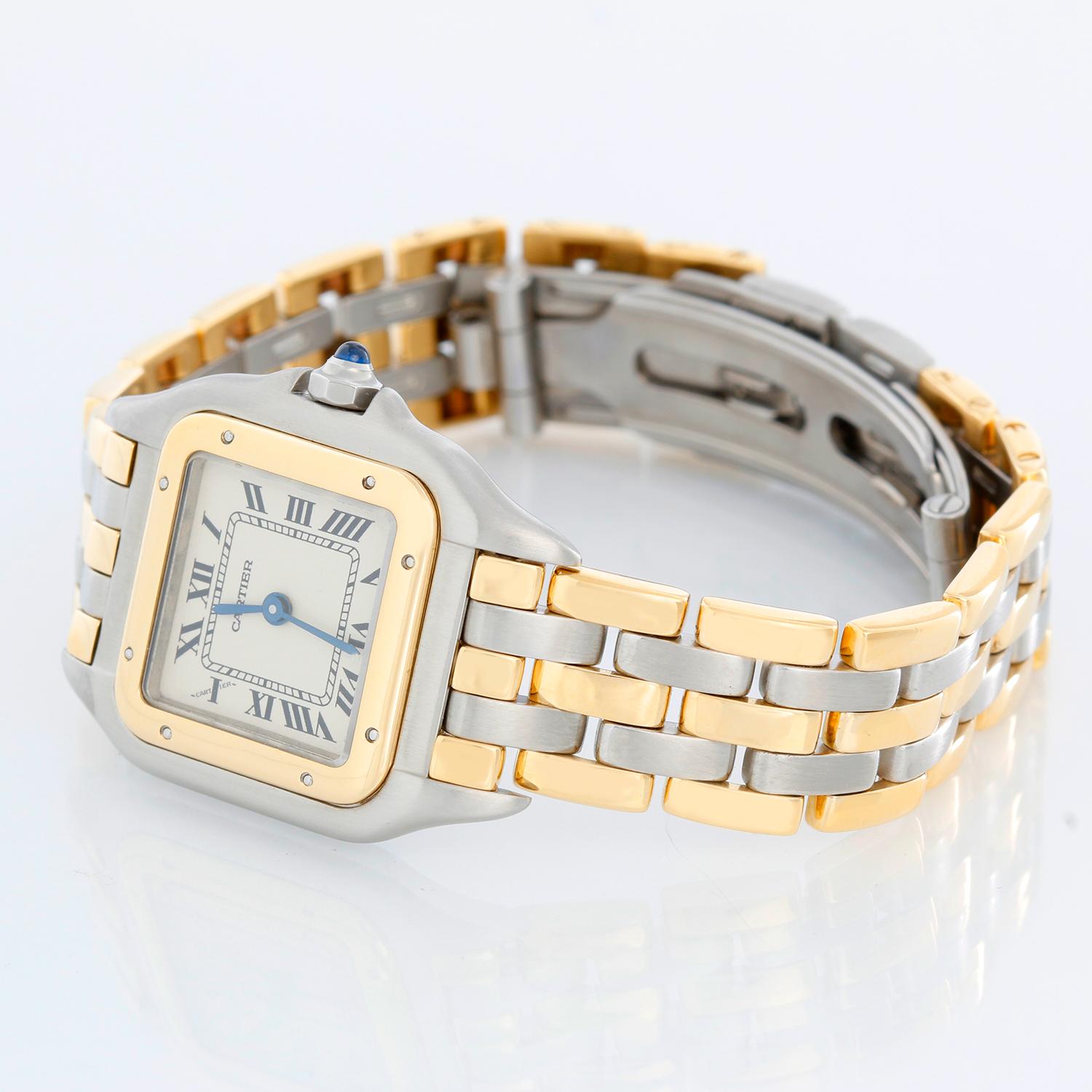 Cartier Panther Ladies 2-Tone 3-Row Steel & Gold Watch - Quartz. Stainless steel case with 18k yellow gold bezel (21mm x 30mm). White dial with black Roman numerals. Stainless steel and 3-row 18k yellow gold Panthere bracelet. Pre-owned with custom