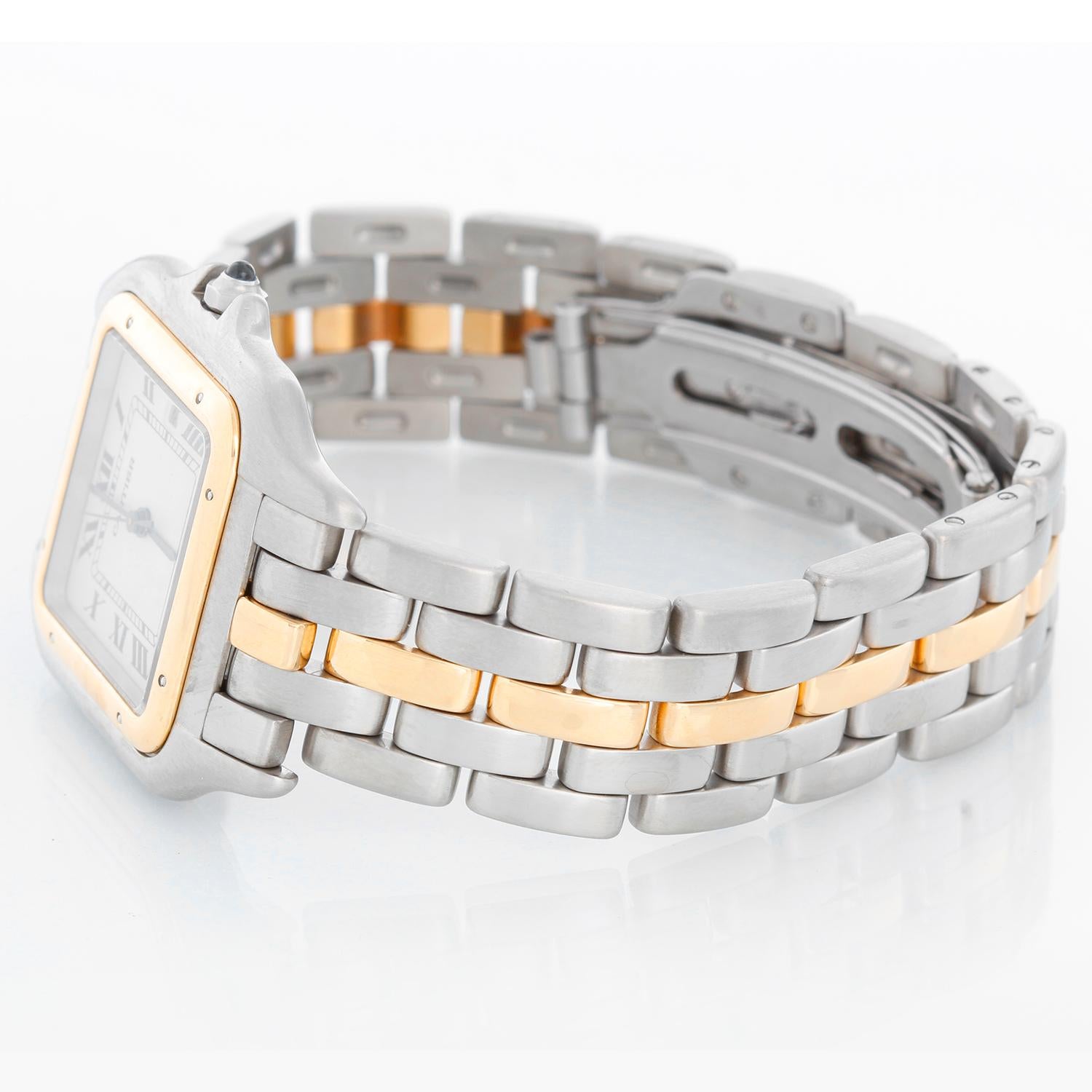 Cartier Panther Ladies 2-Tone Steel & Gold Panthere Watch - Quartz. Stainless steel case with 18k yellow gold bezel (29 x39 mm) . Ivory colored dial with black Roman numerals. Stainless steel Panthere bracelet with 1-row of 18k yellow gold links.