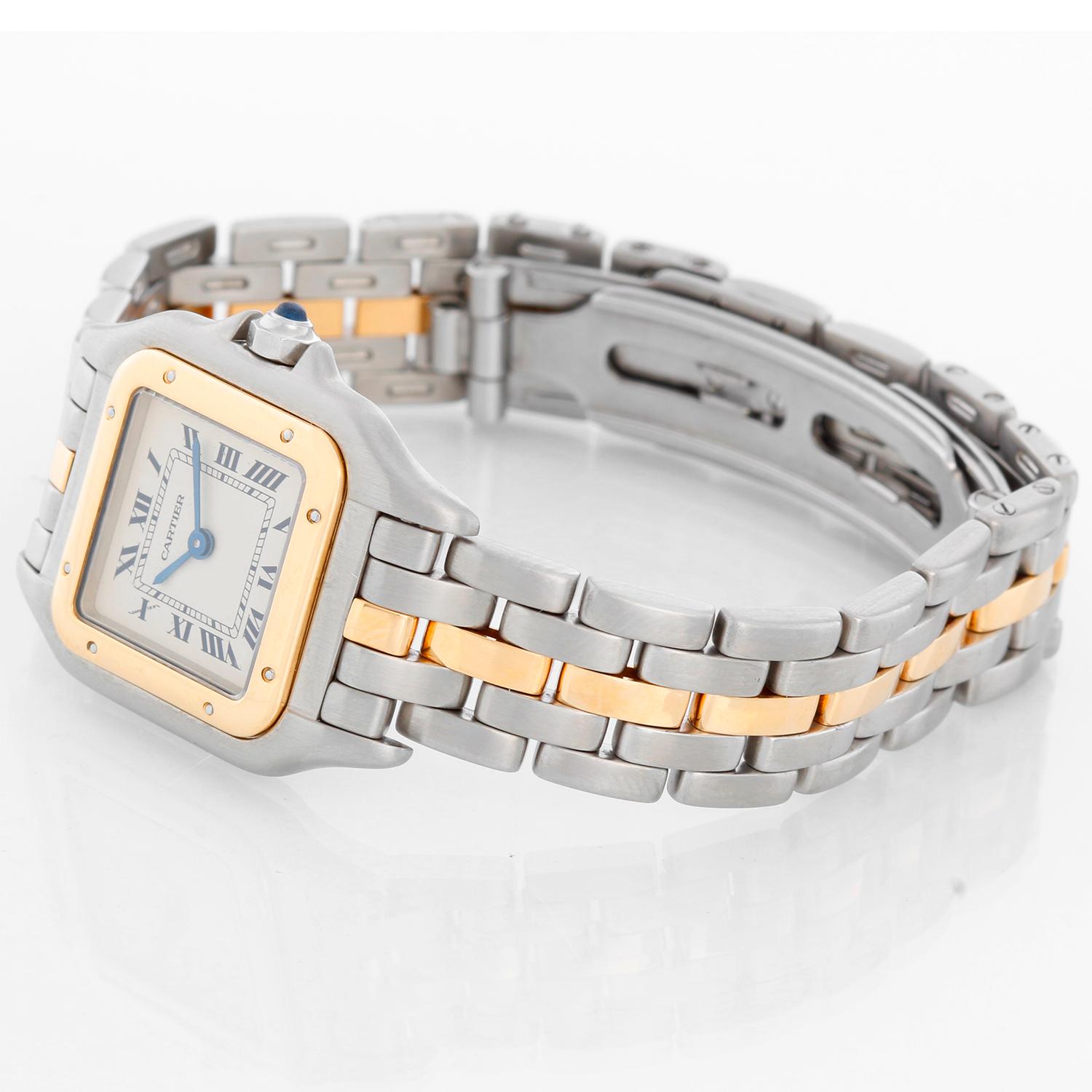 Cartier Panther Ladies 2-Tone Steel & Gold Panthere Watch -  Quartz. Stainless steel case with 18k yellow gold bezel (21mm x 30mm). Ivory colored dial with black Roman numerals. Stainless steel Panthere bracelet with 1-row of 18k yellow gold links.