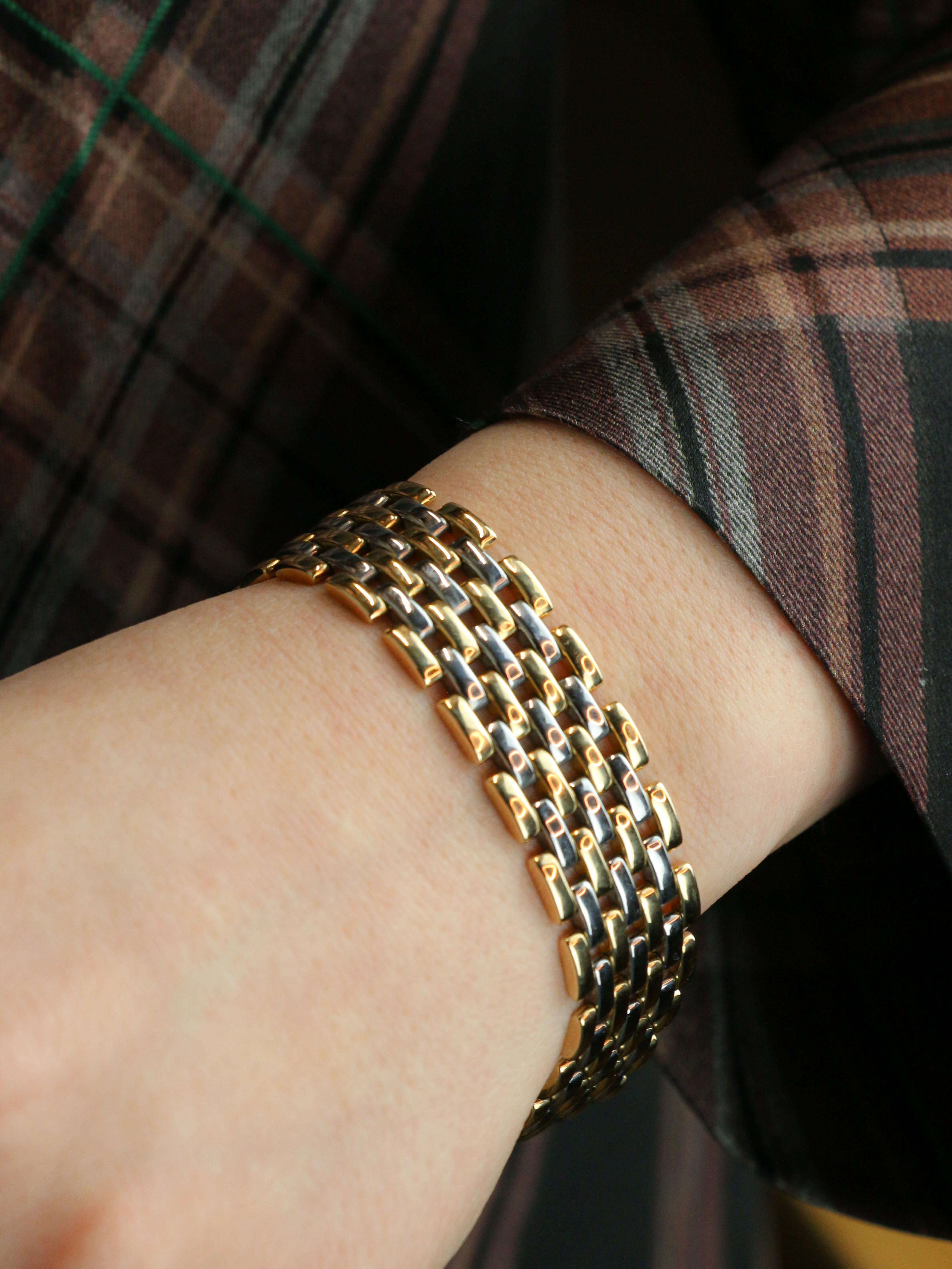 CARTIER pulsera vintage de eslabones pantera de 7 filas en oro amarillo y acero
CARTIER - Pulsera de eslabones pantera de 7 filas, de oro amarillo de 18k (750°/°) y acero, con cierre de hebilla y cierre de seguridad. Obra de los años 80. Firmado
