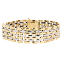 Vintage CARTIER Panther link bracelet in yellow gold and steel