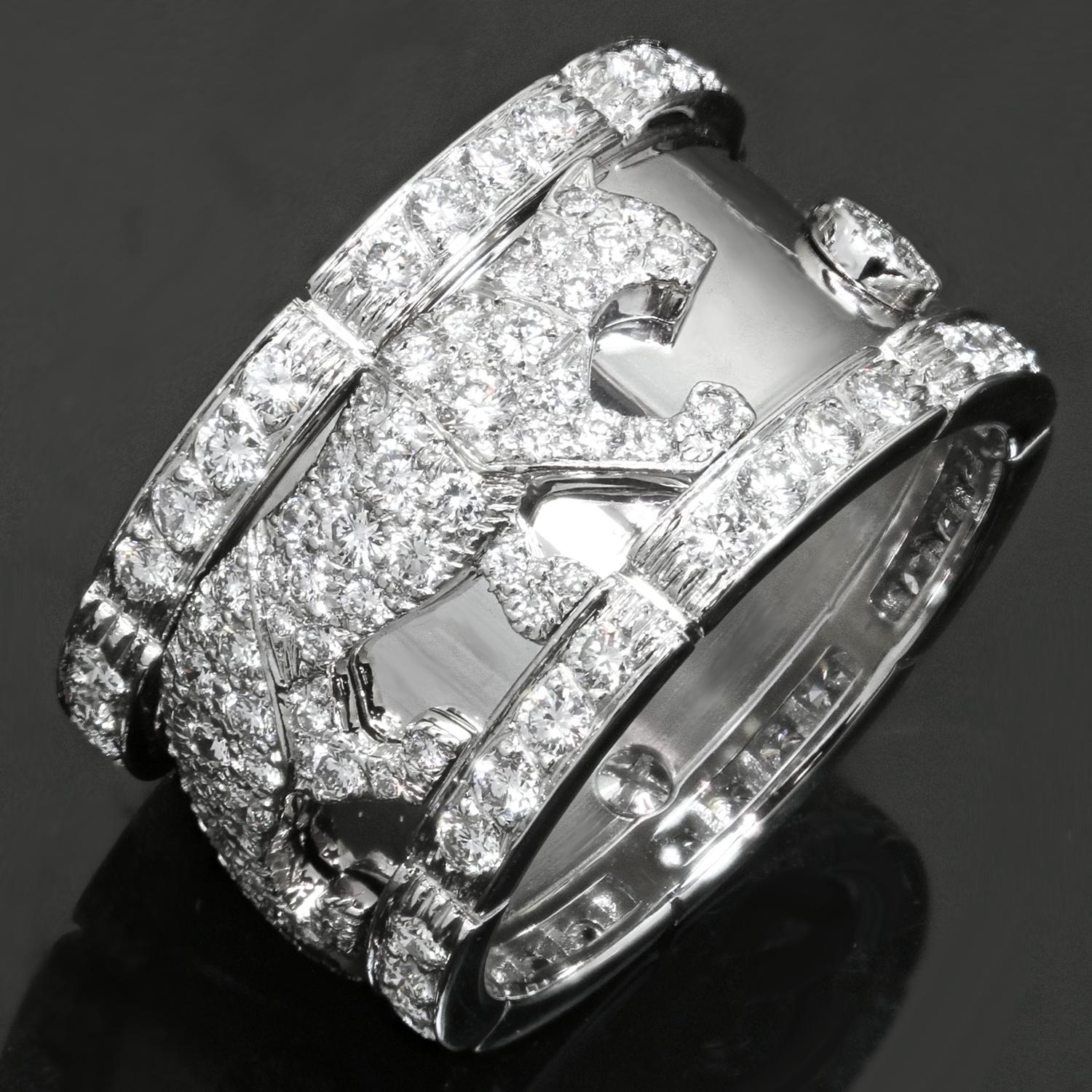 This stunning Cartier Mahango wide band features a design of walking panthers crafted in 18k white gold and pave-set with round brilliant D-F VVS1-VVS2 diamonds weighing an estimated 3.0 carats. Made in France circa 2000s. Measurements: 0.55