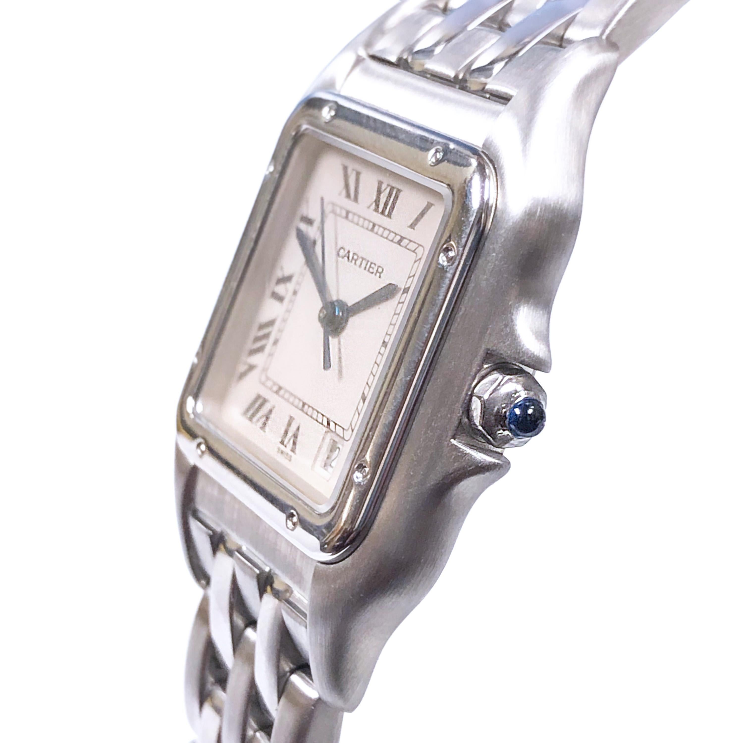 Circa 2000 Cartier Classic Panther Wrist watch, 36 X 27 MM Stainless Steel case, Quartz Movement, White Dial with Black Roman Numerals, Calendar window at the 5 position, sweep seconds hand, scratch resistant crystal and a sapphire Crown. 5/8 inch