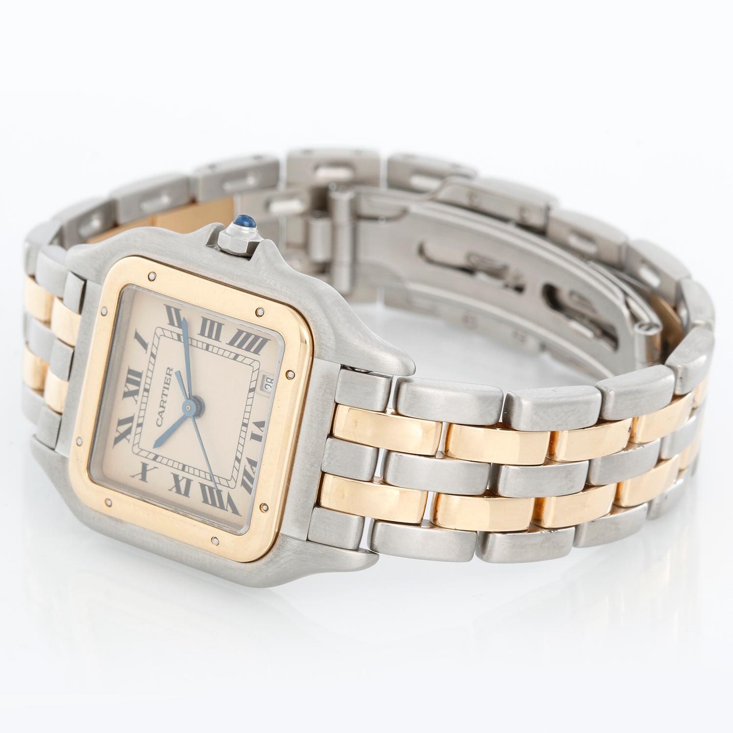 Cartier Panther Midsize 2-Tone  2-Row Steel & Gold Watch - Quartz. Stainless steel case with 18k yellow gold bezel (26mm x 36mm). Ivory colored dial with black Roman numerals date at 5 o'clock. Stainless steel and 2-row 18k yellow gold Panthere