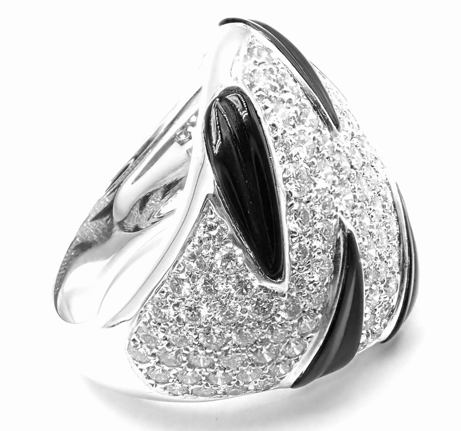18k White Gold Diamond & Black Onyx Panther Panthere Claw Ring by Cartier.  
This ring comes with Cartier box.
With 145 Round brilliant cut diamonds VVS1 clarity, E color total weight approximately 1.70ct 
6 Black Onyx stones
Details: 
Ring Size: