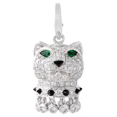 Cartier Pendentif breloque panthère en or blanc 18 carats, diamant, émeraude et onyx