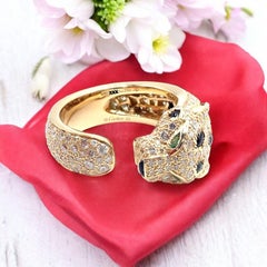 Cartier, bague panthère en or jaune, diamant, émeraude et onyx