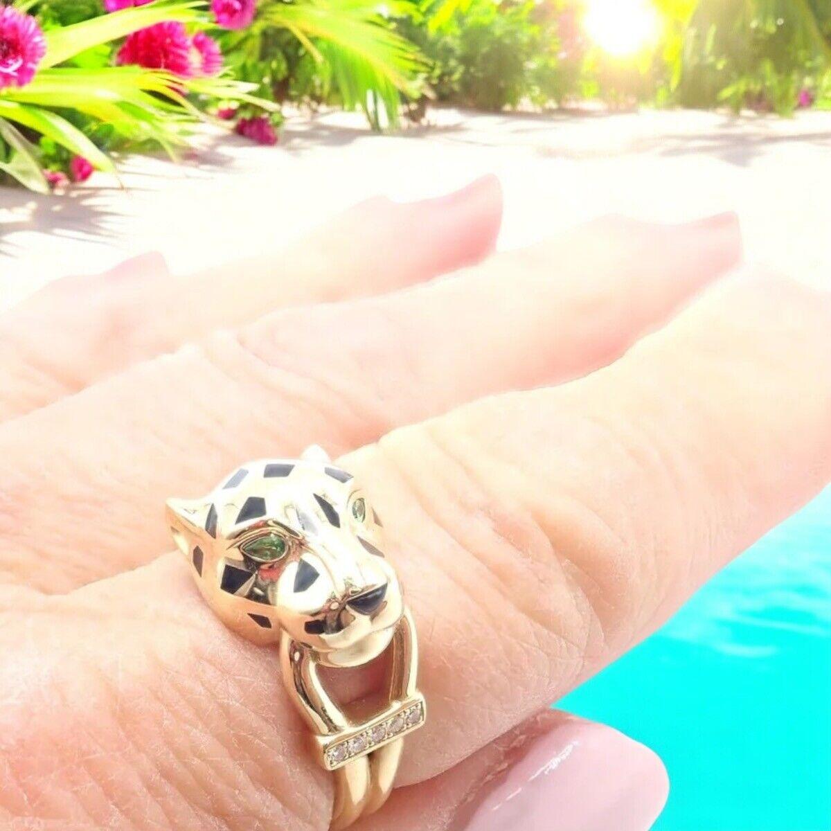 18k Yellow Gold Panther Diamond Lacquer Tsavorite Ring by Cartier. 
From Cartier's 