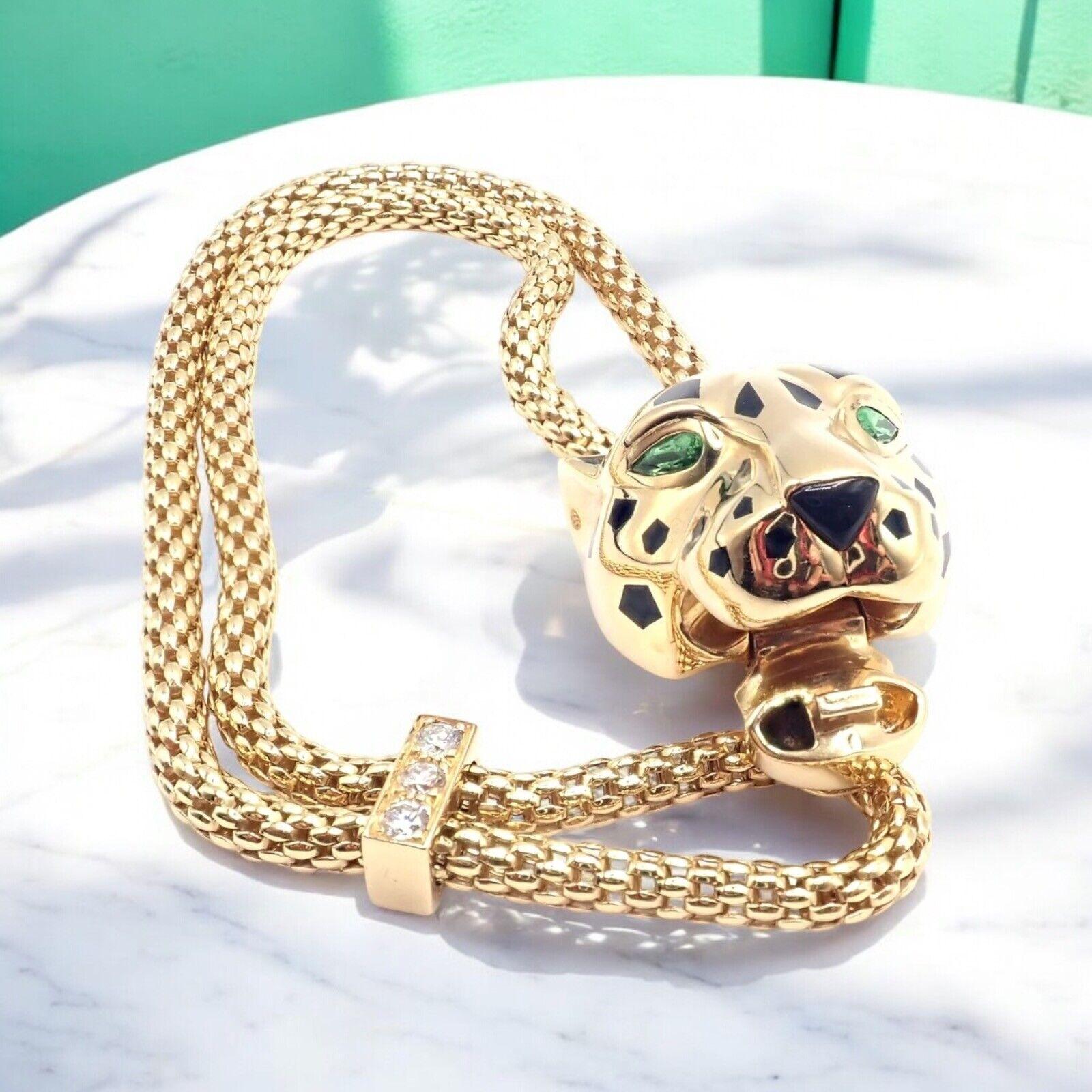 18k Yellow Gold Panther Diamond Tsavorite Lacquer Bracelet by Cartier. 
With 3 round brilliant cut diamond VS1 clarity, E color total weight approximate .16ct
Two tsavorite and Black Lacquer. 
The Cartier Panthère Panther bracelet epitomizes luxury