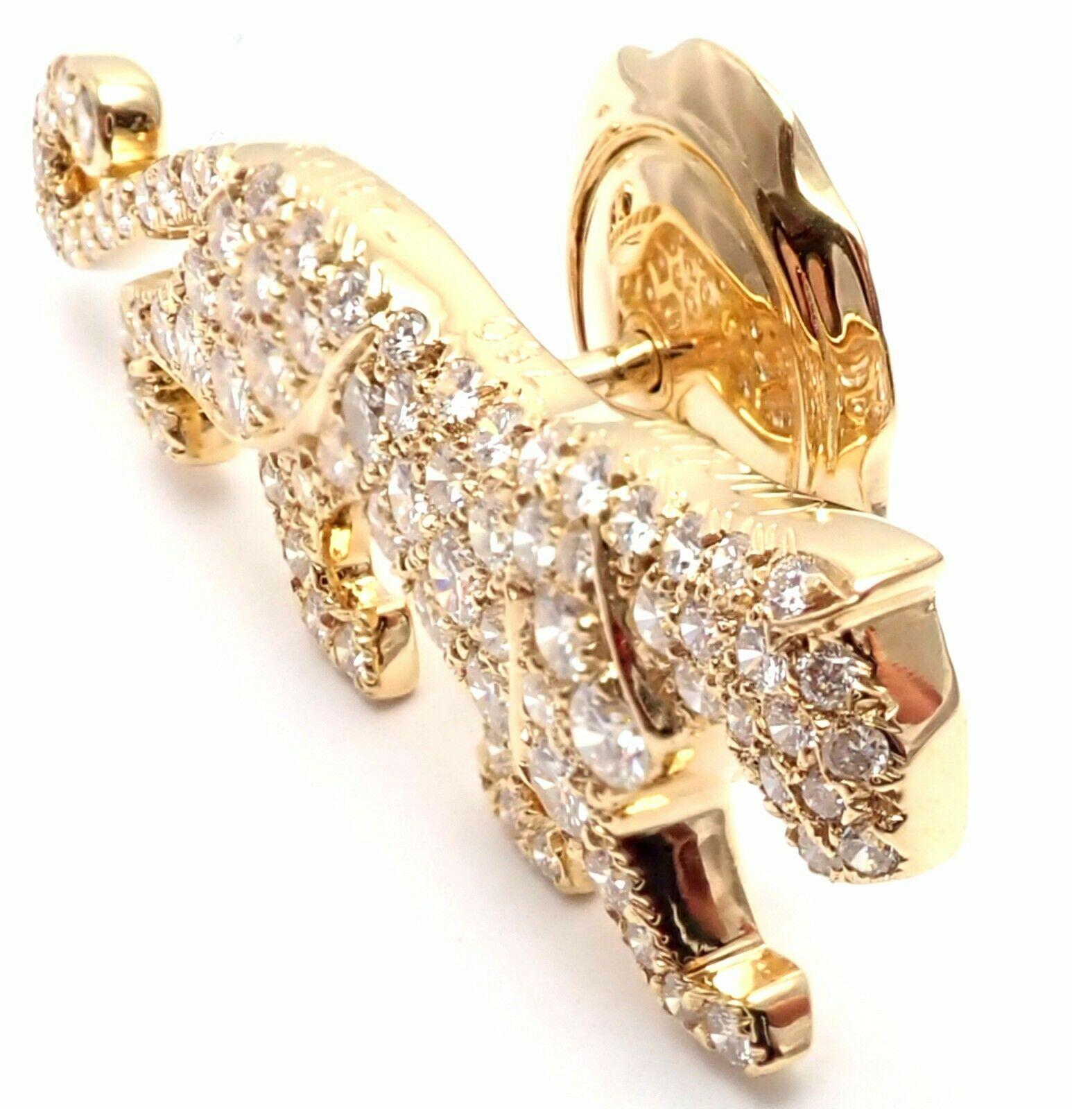 18k Yellow Gold Diamond Panther Tie Lapel Pin by Cartier. 
With Round brilliant cut diamonds VVS1 clarity E color.
This pin comes with Cartier box and Cartier service paper.
Details:
Measurements: 34mm x 11mm
Weight: 4.1 grams
Stamped Hallmarks: