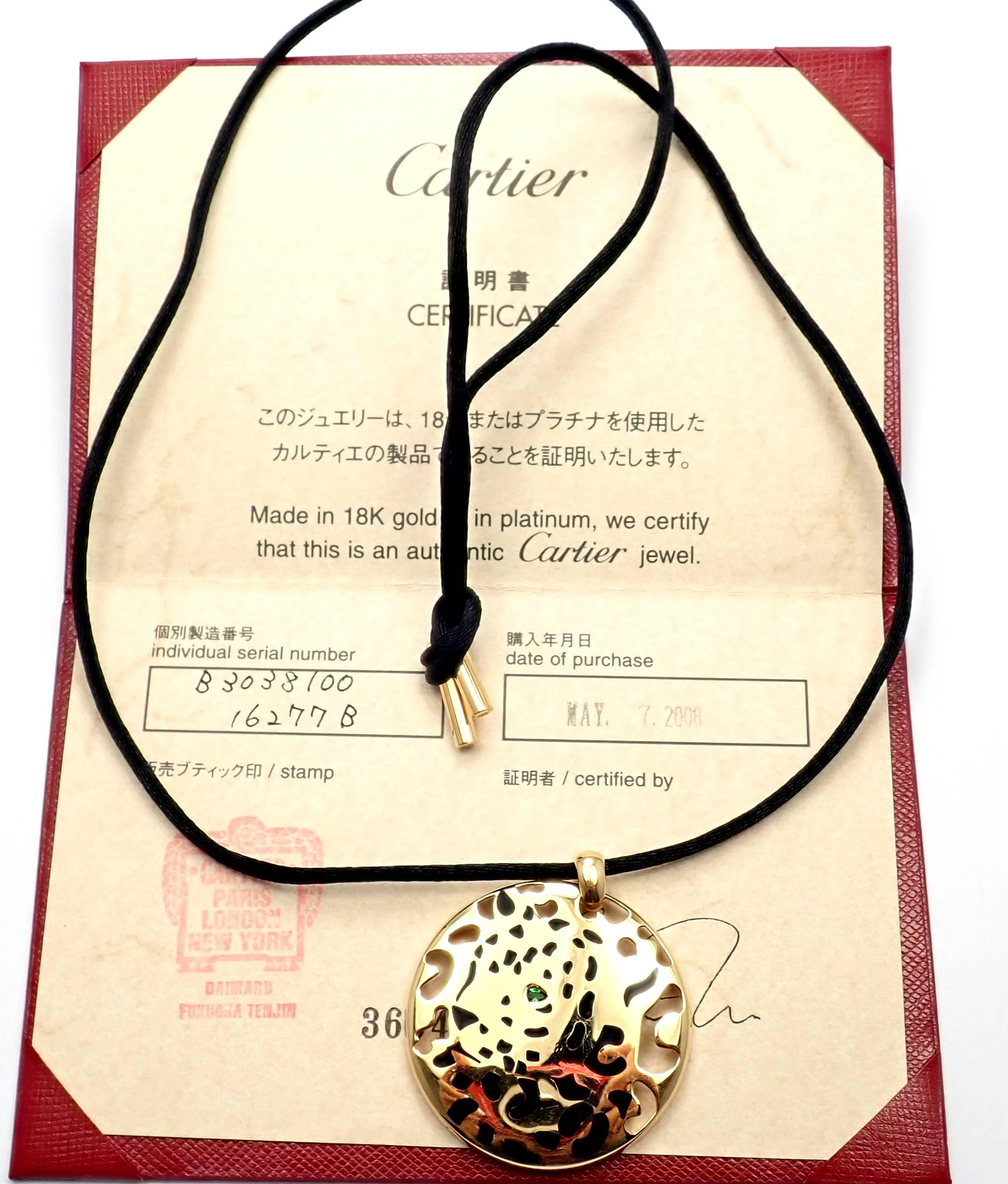 18k Yellow Gold Panther Lacquer Tsavorite Garnet Pendant Necklace by Cartier. 
Part of Cartier's stunning Panthere collection. 
With 1 small Tsavorite garnet in the eye.
This necklace comes with Cartier box and Cartier certificate.
Details:
Length
