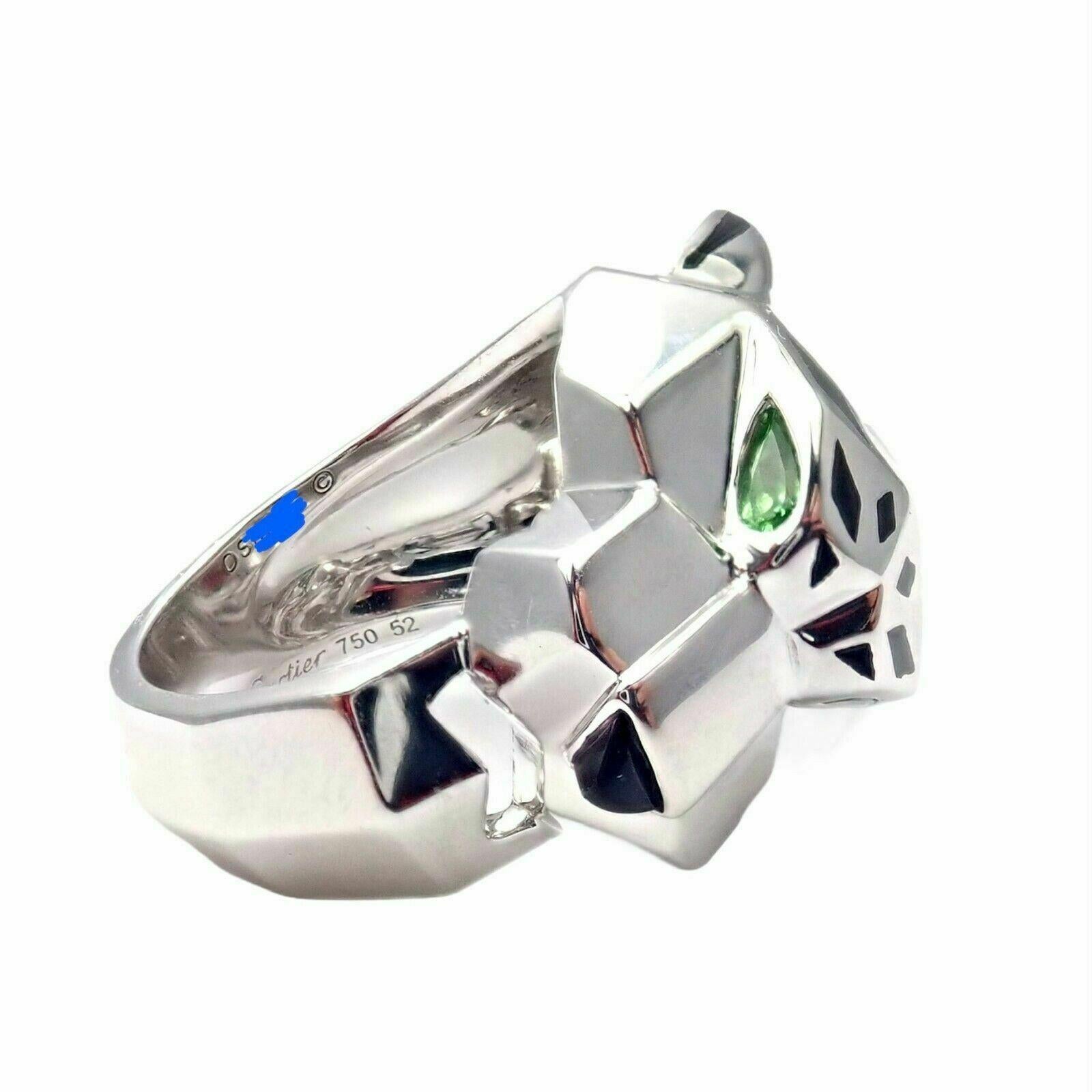 18k White Gold Panther Peridot, Onyx, and Lacquer Ring by Cartier. 
From Cartier's 