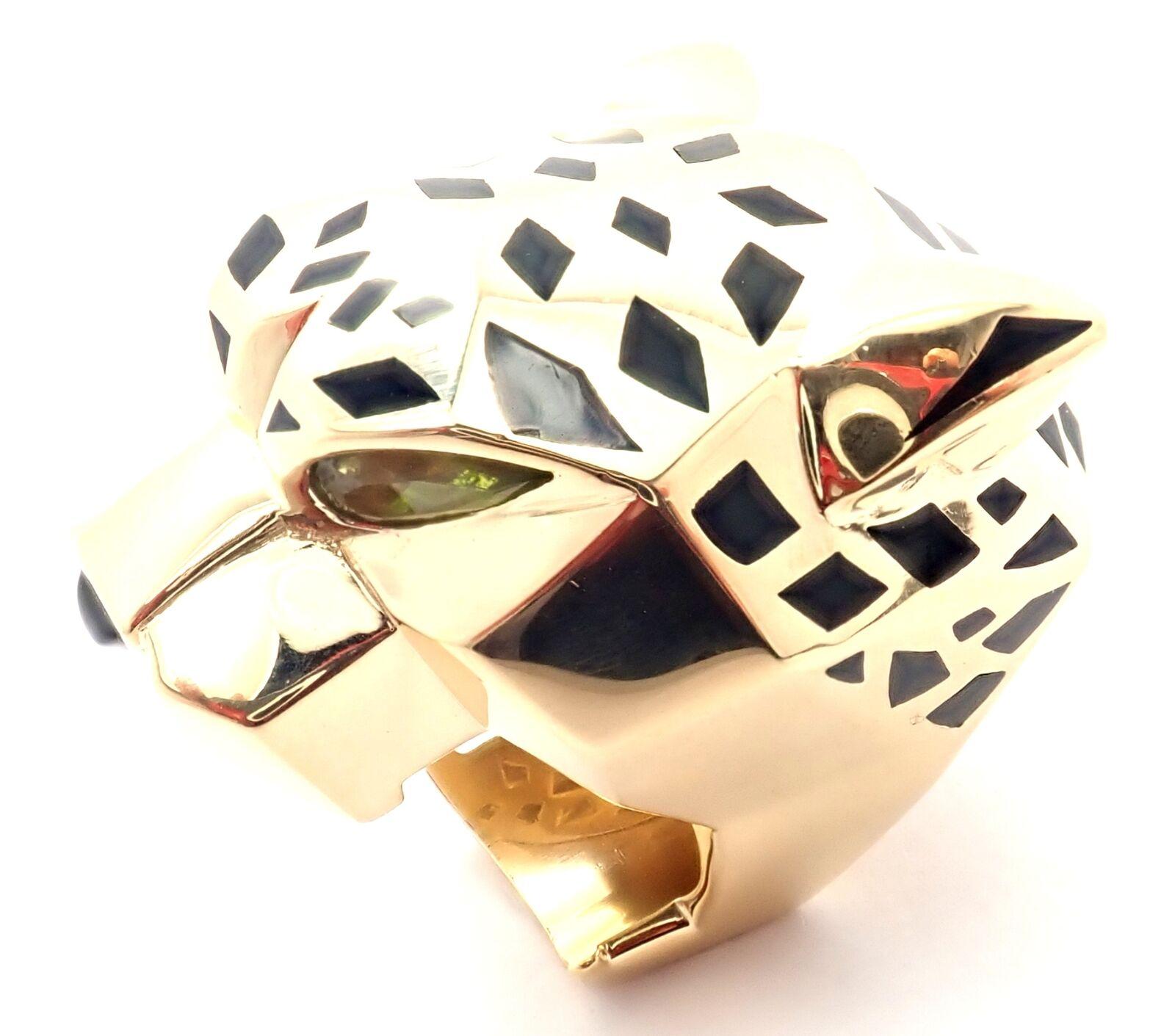18k Yellow Gold Panther Peridot, Onyx, and Lacquer Ring by Cartier. 
From Cartier's 