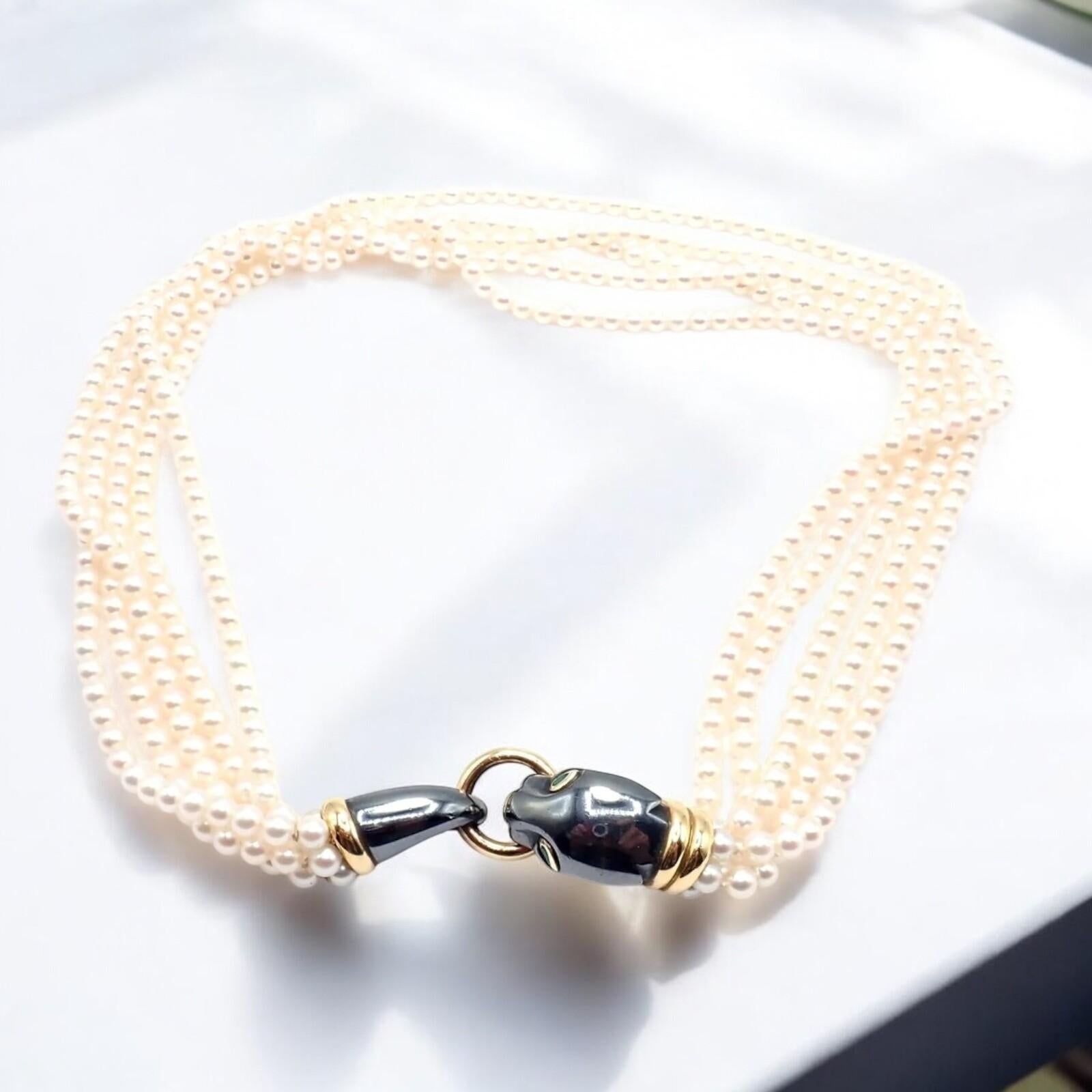 18k Yellow Gold & Silverium (800 silver) Panther Panthere Emerald Pendant Pearl Necklace by Cartier.
This Panthère de Cartier necklace features the iconic panther motif in radiant 18k yellow gold and Silverium, adorned with lustrous pearls and vivid