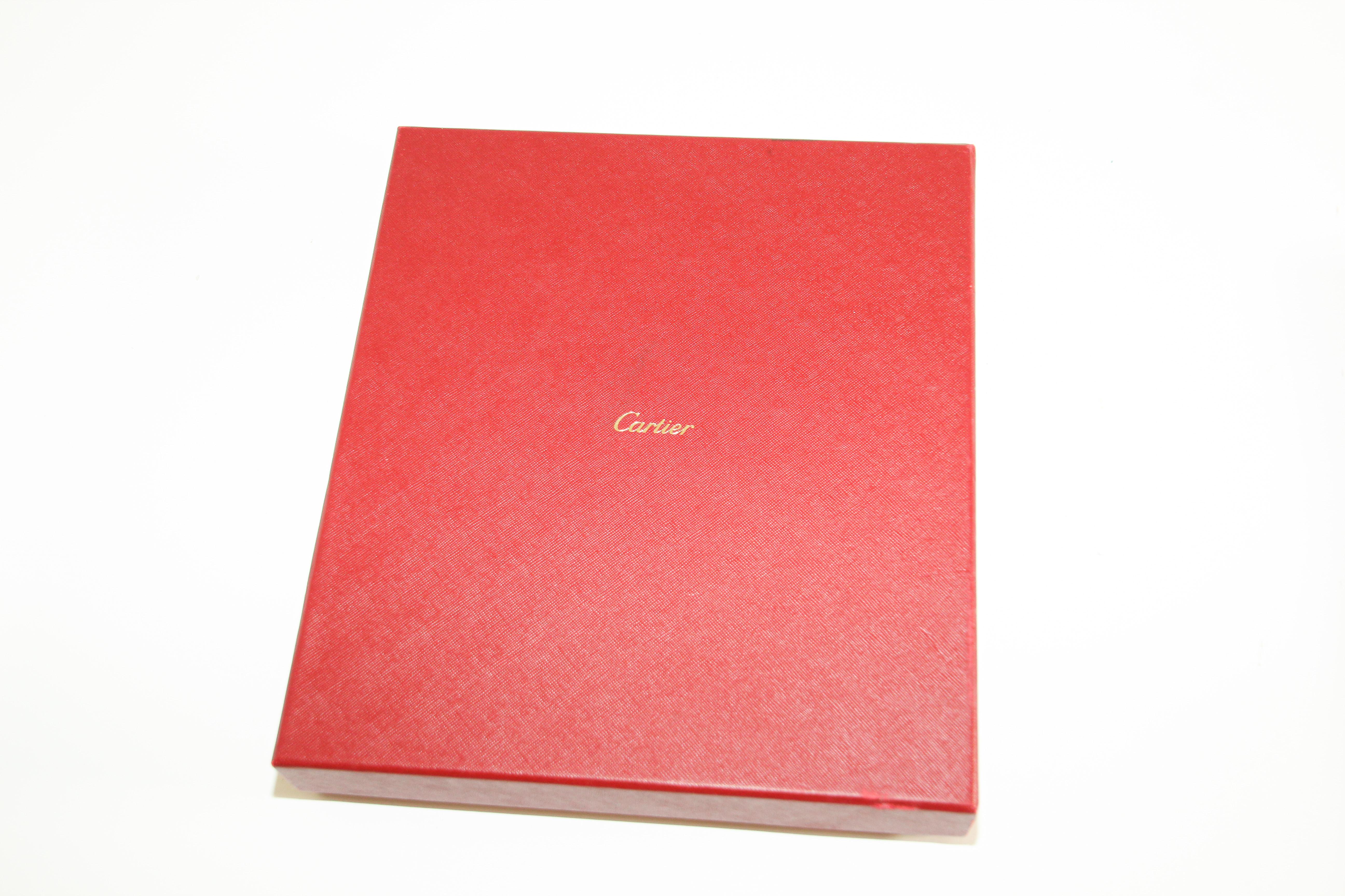 This is a circa 1980s original Cartier panther photo album.
Cartier luxe photo album in burgundy leather a beautiful and exquisite album where you can place and store those valuable photos.
Cartier's photo album features the signature panther. It's