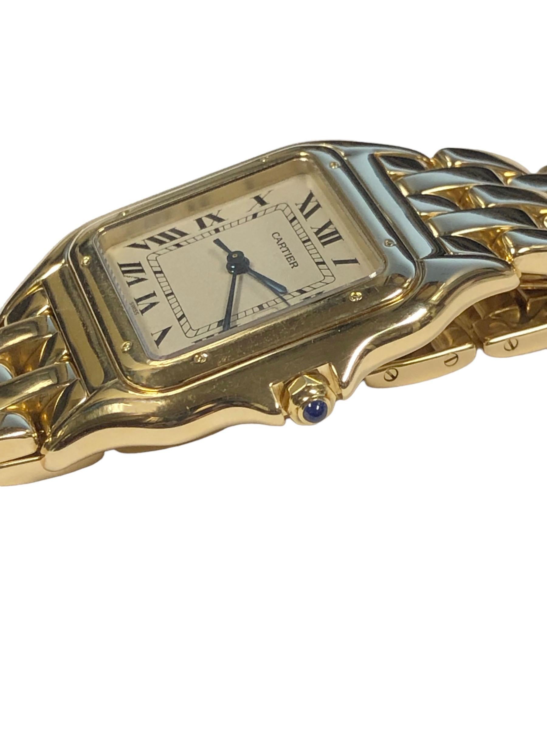 Circa 2000 Cartier Panther collection Wrist Watch, 29 x 29 M.M. 18k Yellow Gold 3 piece case, Quartz movement, Sapphire Crown, off white dial with Black Roman numerals, calendar window at the 3 position and a sweep seconds hand. 5/8 inch wide